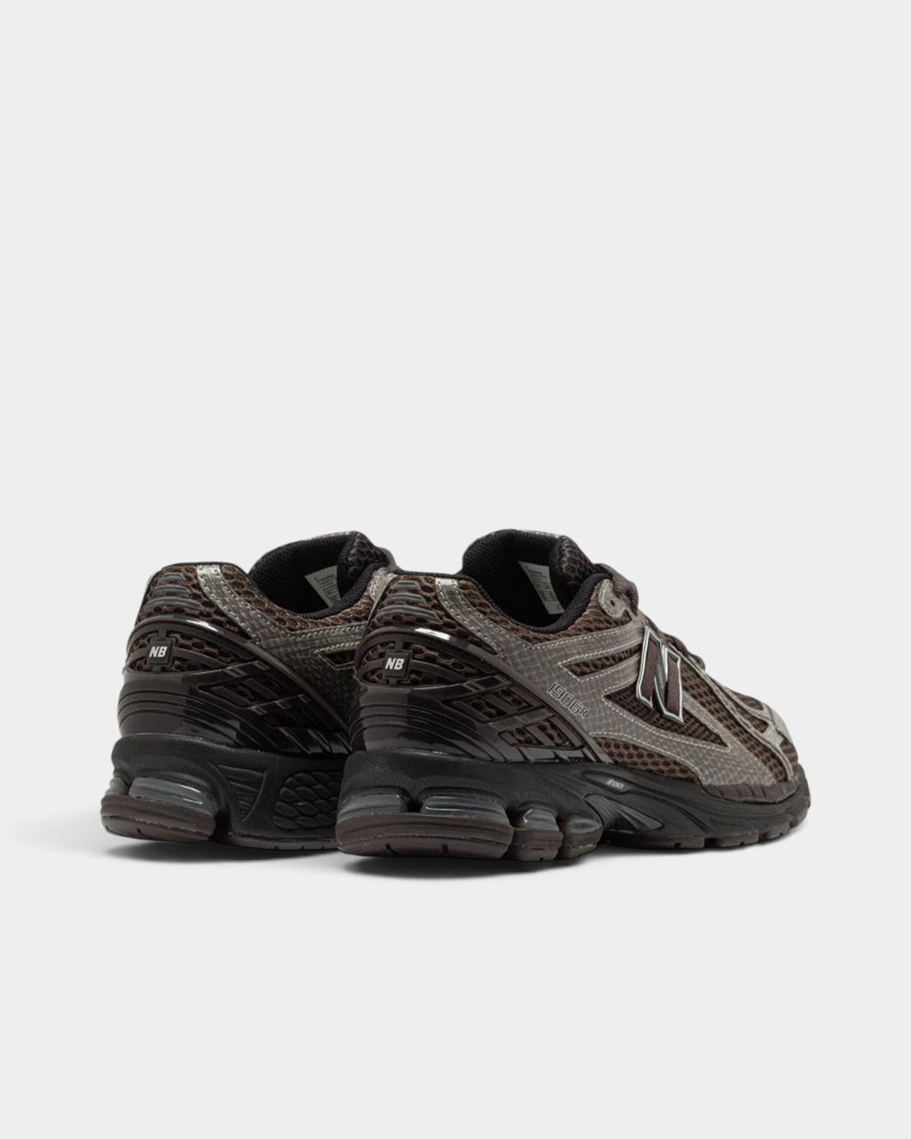 Lockwood Avenue New Balance 1906R sneakers in brown with snakeskin-print synthetic overlays and black mesh details.