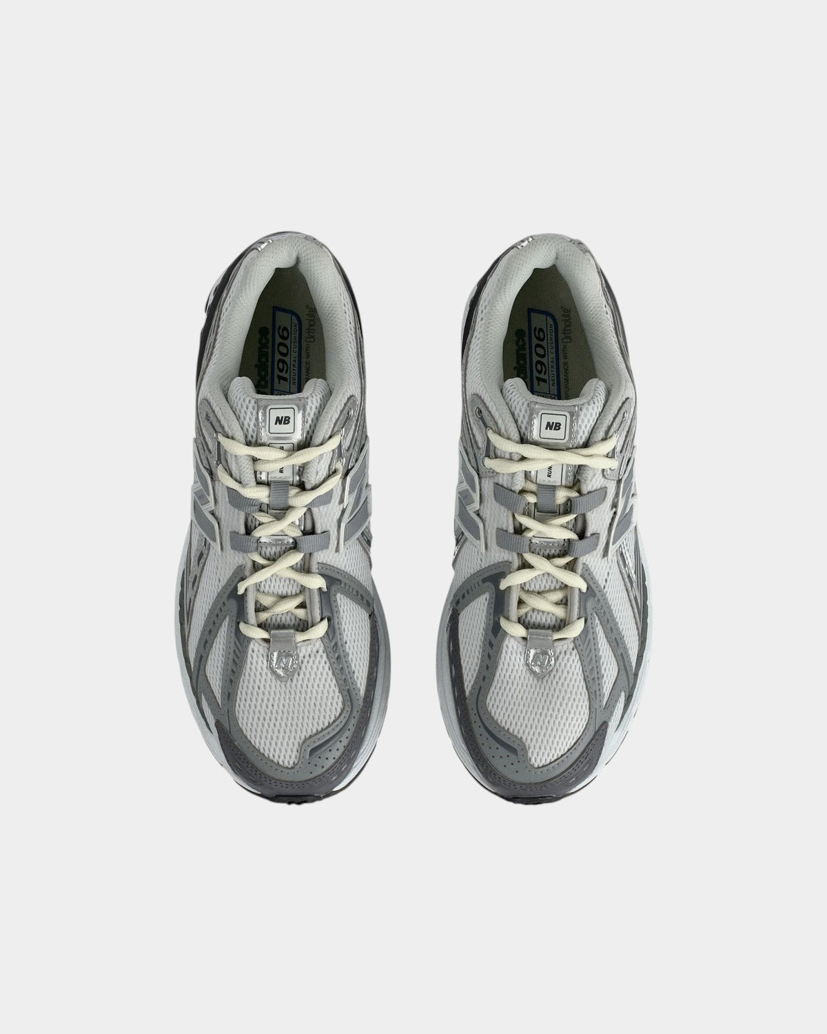 Lockwood Avenue New Balance 1906R grey performance running shoes with mesh upper and metallic overlays, top view