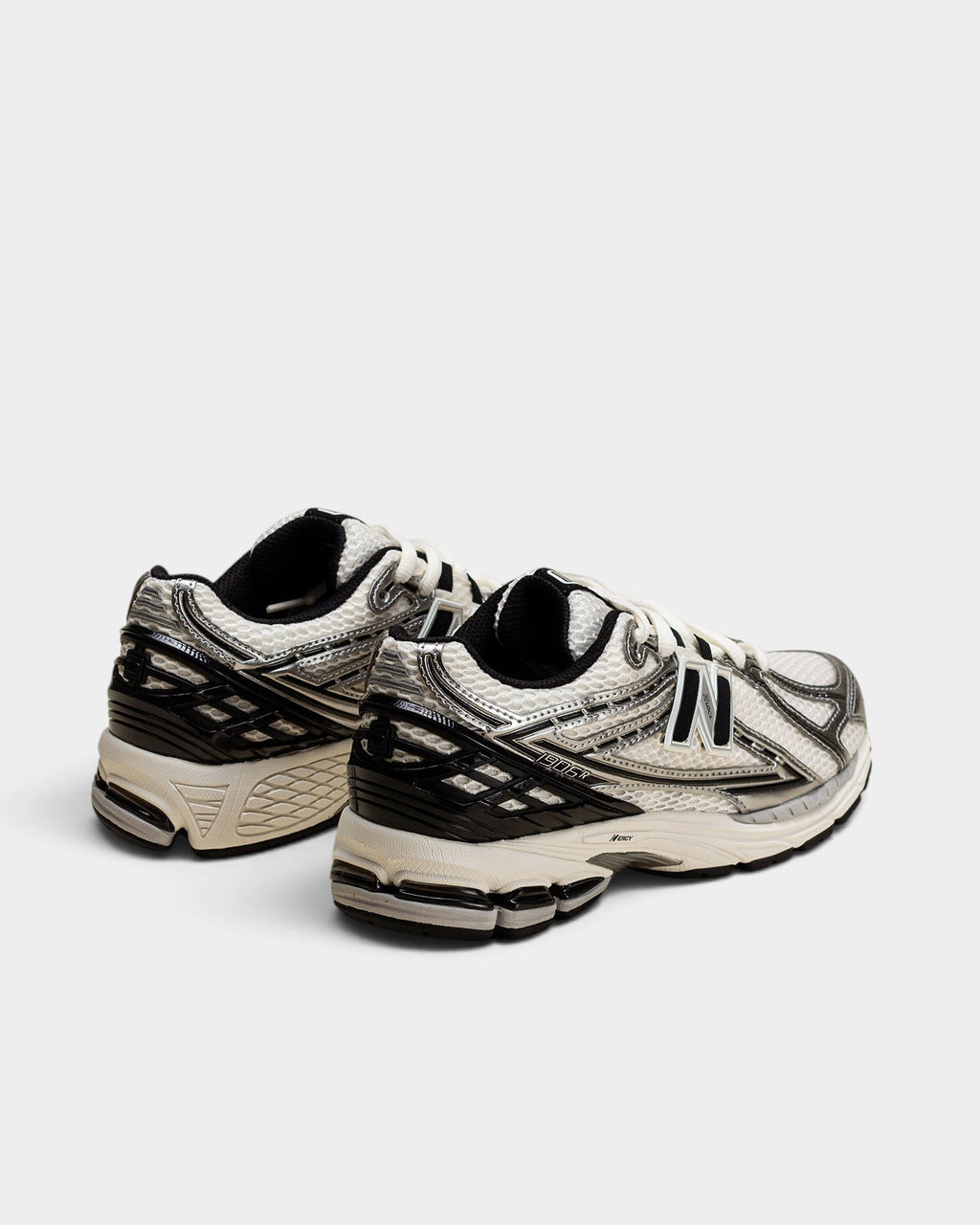 Lockwood Avenue New Balance 1906R sneakers in white and metallic silver with mesh upper and black detailing