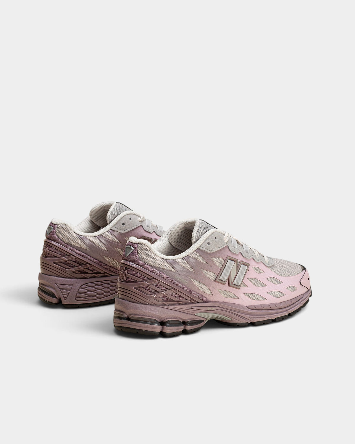 Lockwood Avenue New Balance 1906W sneakers in Ice Wine pink and gray gradient with mesh and Stability Web overlays