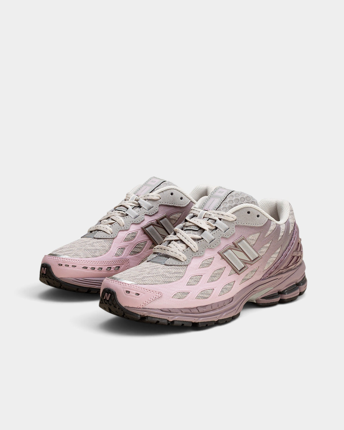 Lockwood Avenue New Balance 1906W sneakers in Ice Wine pink and gray gradient with mesh and Stability Web panels.
