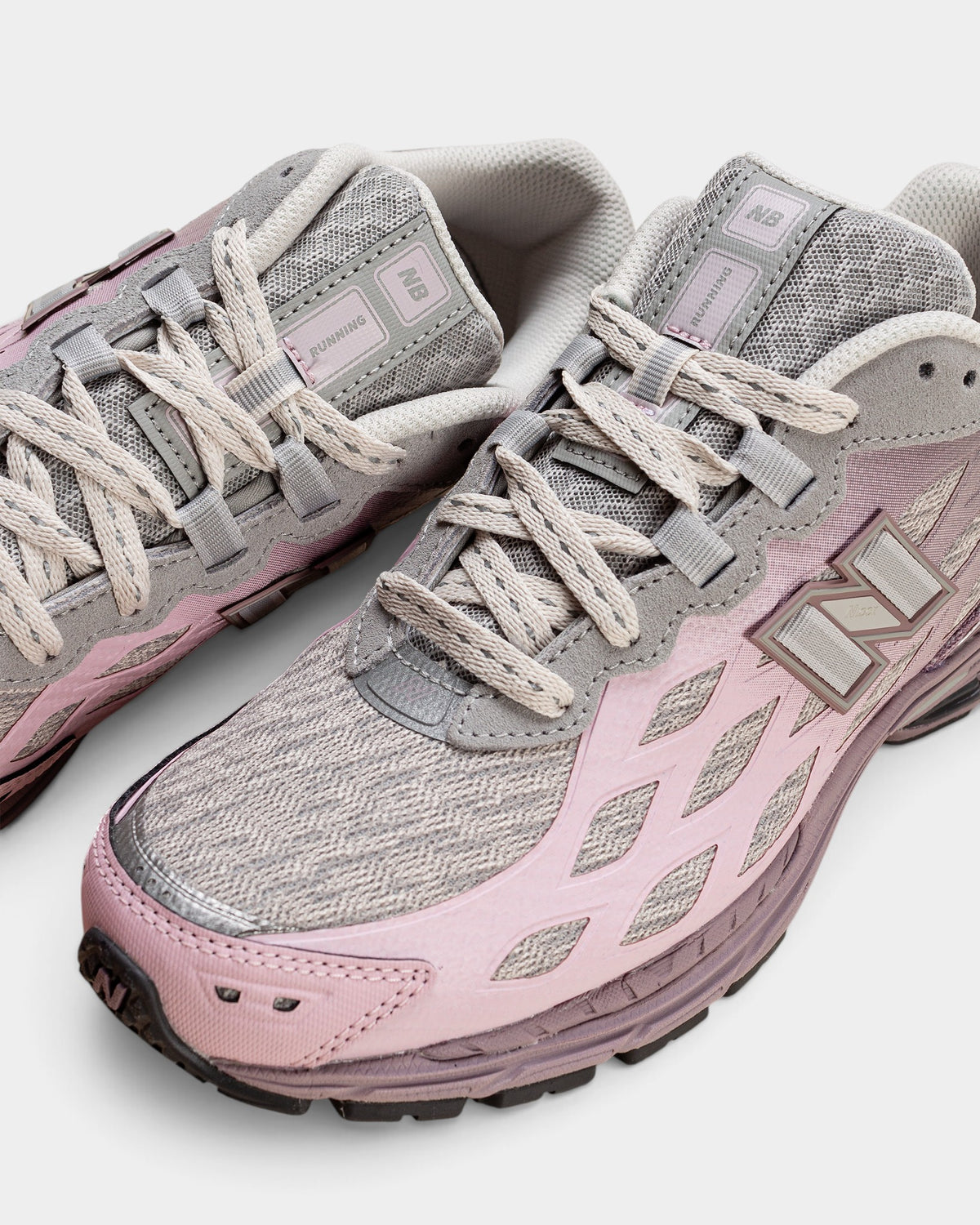 Lockwood Avenue New Balance 1906W sneakers in Ice Wine pink and gray gradient with knitted mesh and cream laces