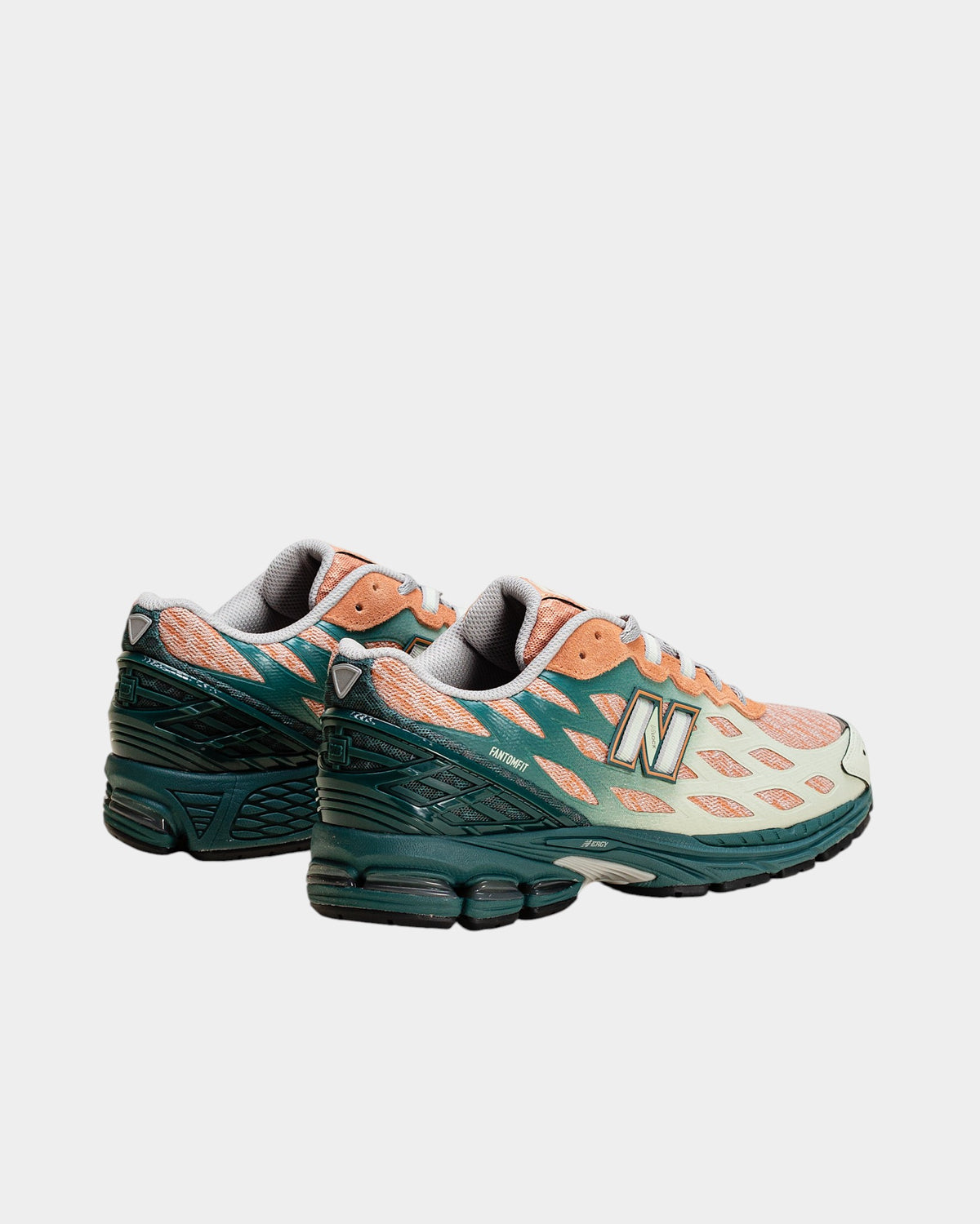 Lockwood Avenue New Balance 1906W sneakers in spruce, sparrow, and mint with webbed mesh overlays and heel pods.