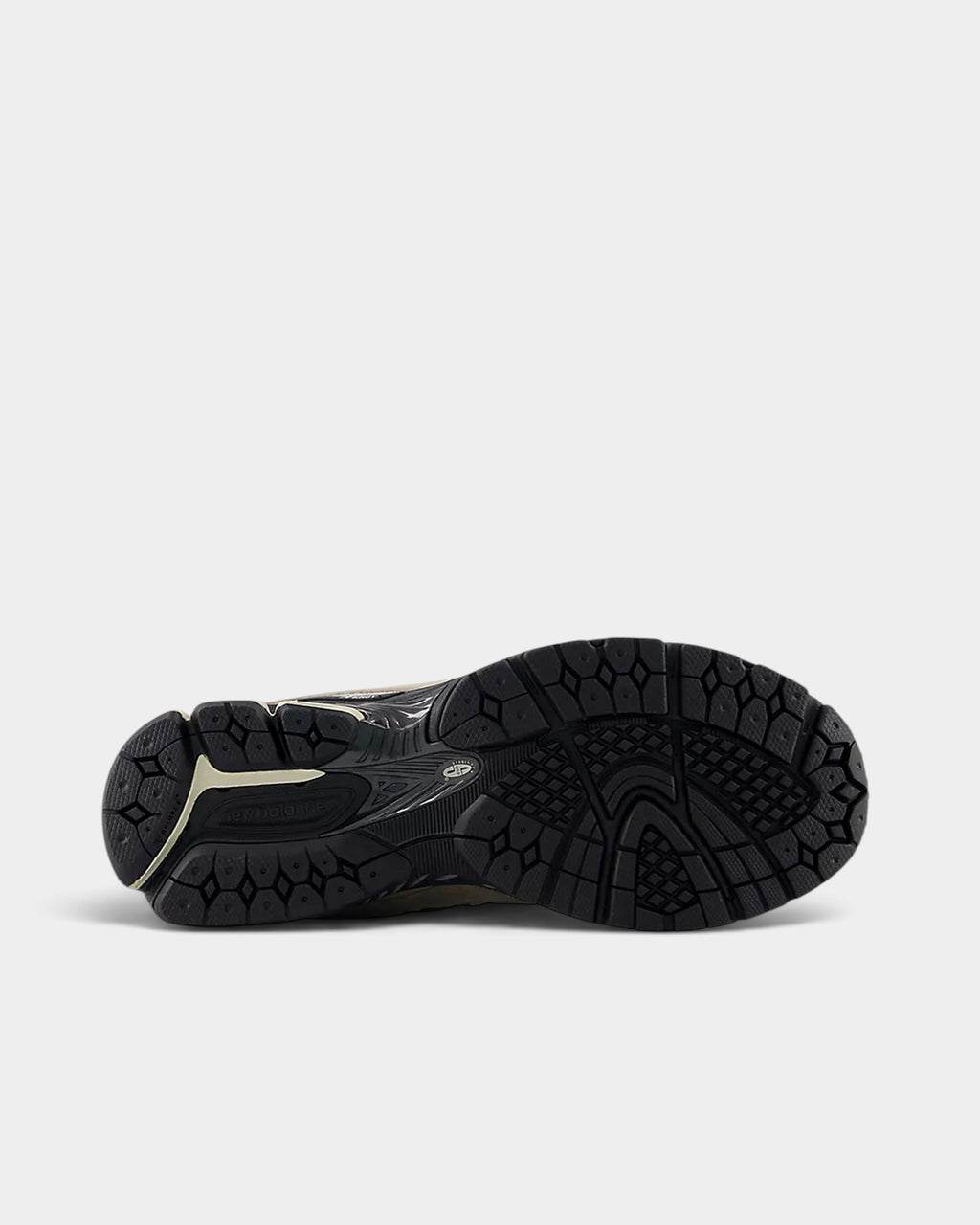 Lockwood Avenue New Balance 2002R sneaker showing the black N-ergy rubber outsole and stability web design