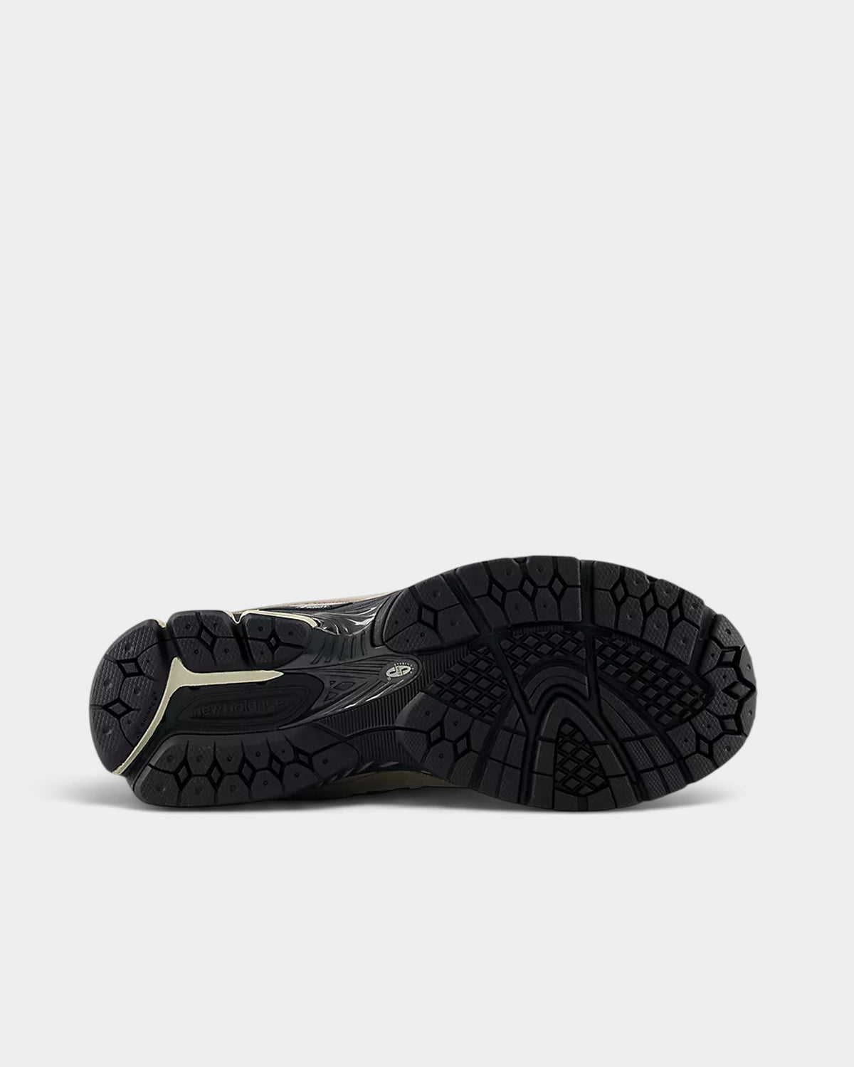 Lockwood Avenue New Balance 2002R sneaker showing the black N-ergy rubber outsole and stability web design