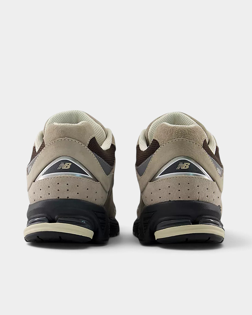 Lockwood Avenue New Balance 2002R sneakers in arid stone and black coffee suede and mesh, rear view.
