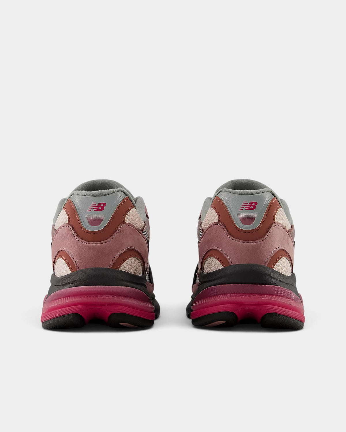 Lockwood Avenue New Balance 2010 sneakers in rosewood, violet, and pink, showing the rear view of the chunky soles.