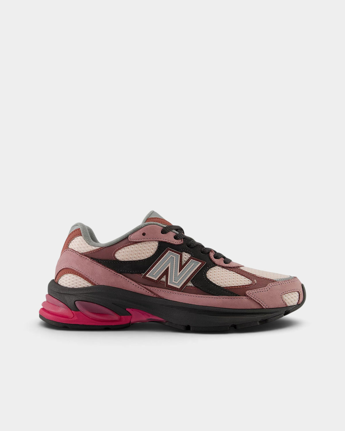 Lockwood Avenue New Balance 2010 sneakers in rosewood, violet crush, and pink with mesh, nubuck, and leather overlays.