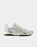 Lockwood Avenue New Balance 204L sneakers in silver metallic with garter snake accents and suede N logo