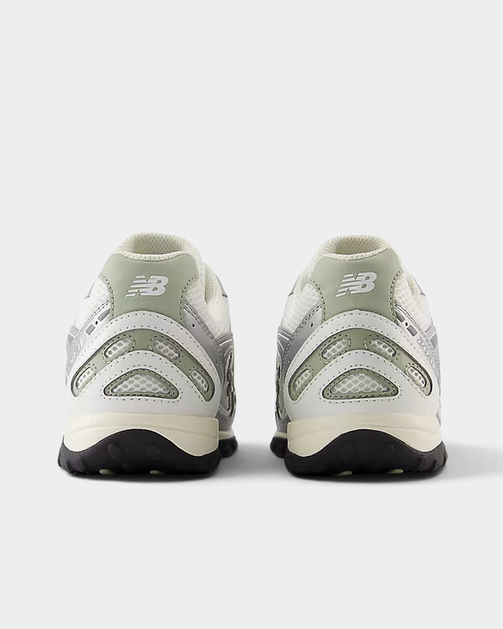 Lockwood Avenue New Balance 204L sneakers in silver metallic and sage green with suede and synthetic mesh details.