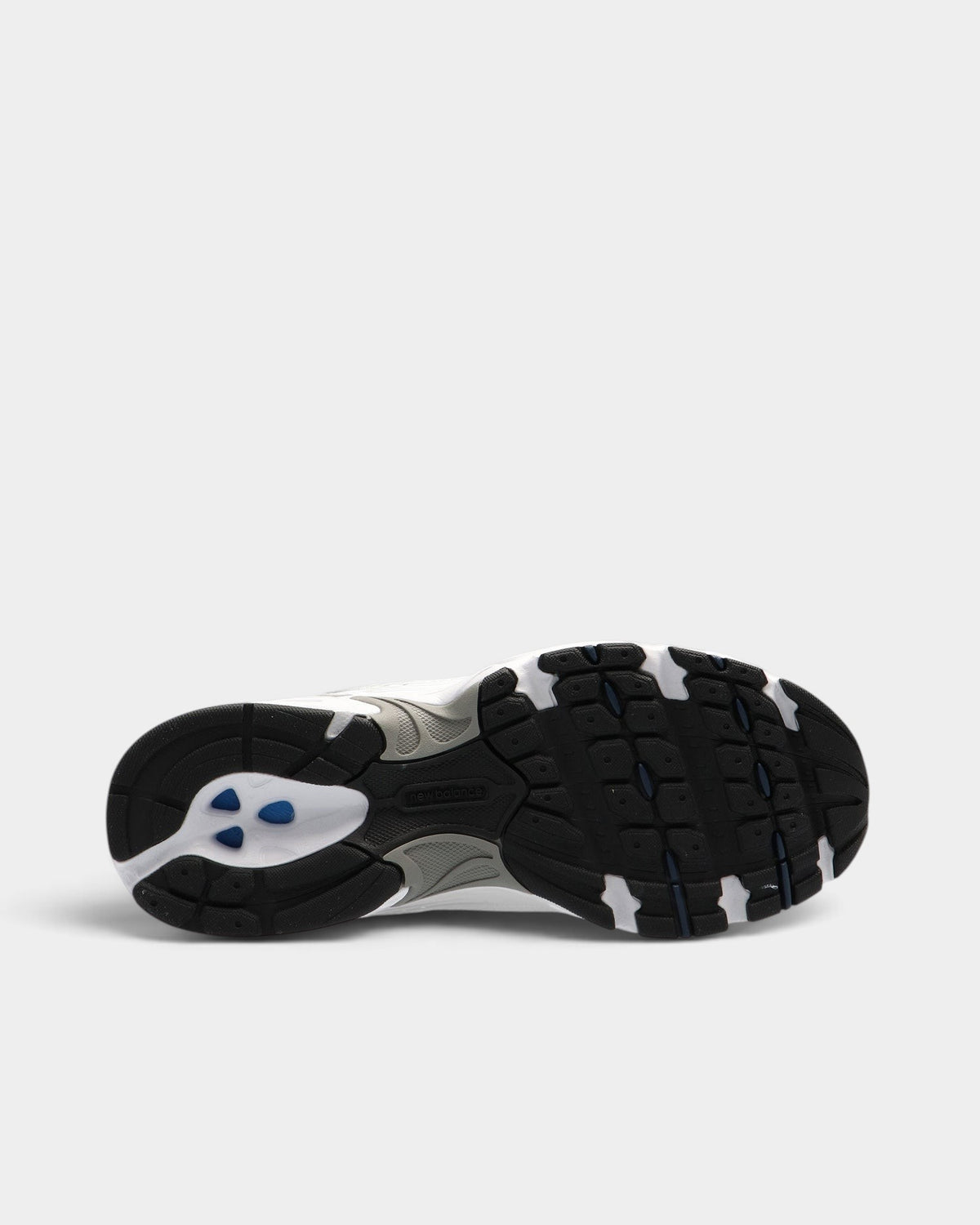 Lockwood Avenue New Balance 530 sneaker outsole in black and white with blue accents and ABZORB cushioning technology.