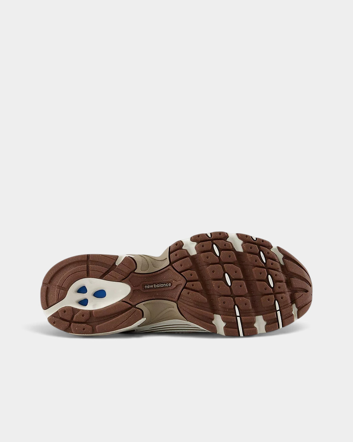 Lockwood Avenue New Balance 530 shoe showing the brown and beige rubber outsole with blue accent detail
