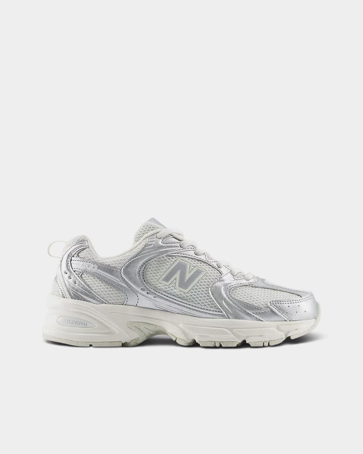 Lockwood Avenue New Balance 530 retro runner in silver metallic mesh with reflective detailing and ABZORB midsole.