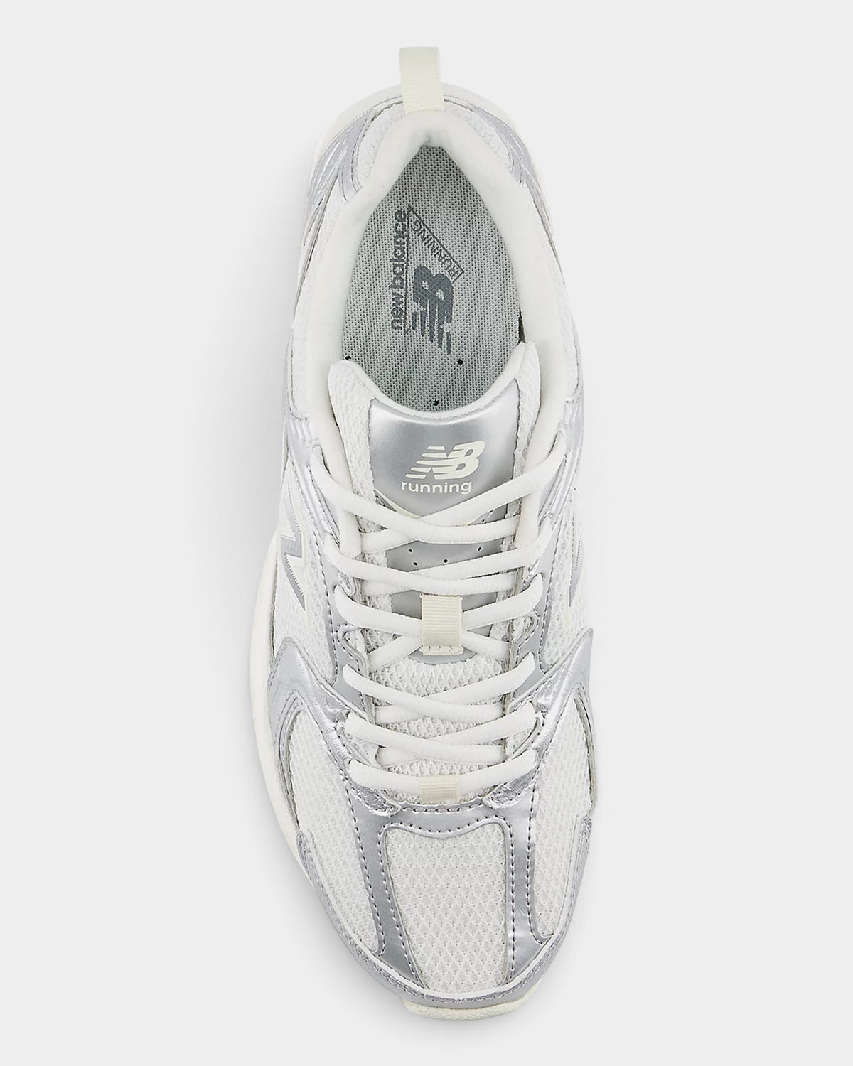 Lockwood Avenue New Balance 530 retro runner in white mesh with metallic silver overlays and reflective details