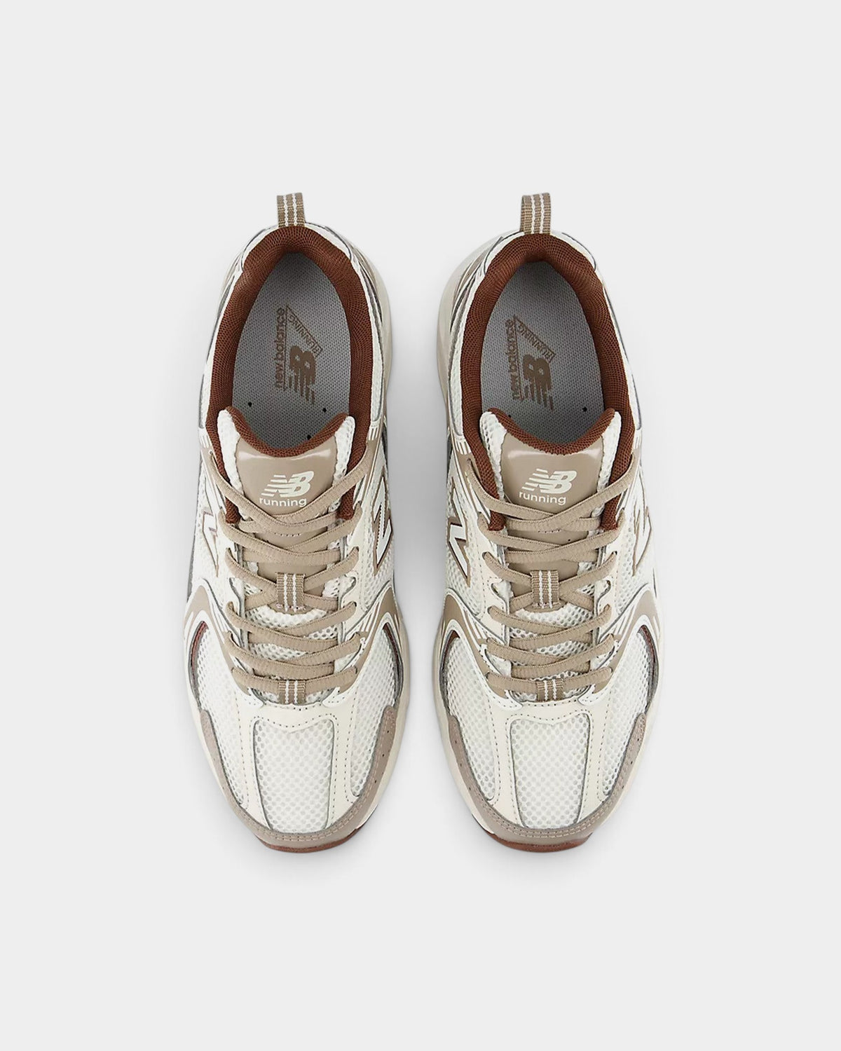 Lockwood Avenue New Balance 530 sneakers in white and brown mesh with synthetic overlays and ABZORB midsole