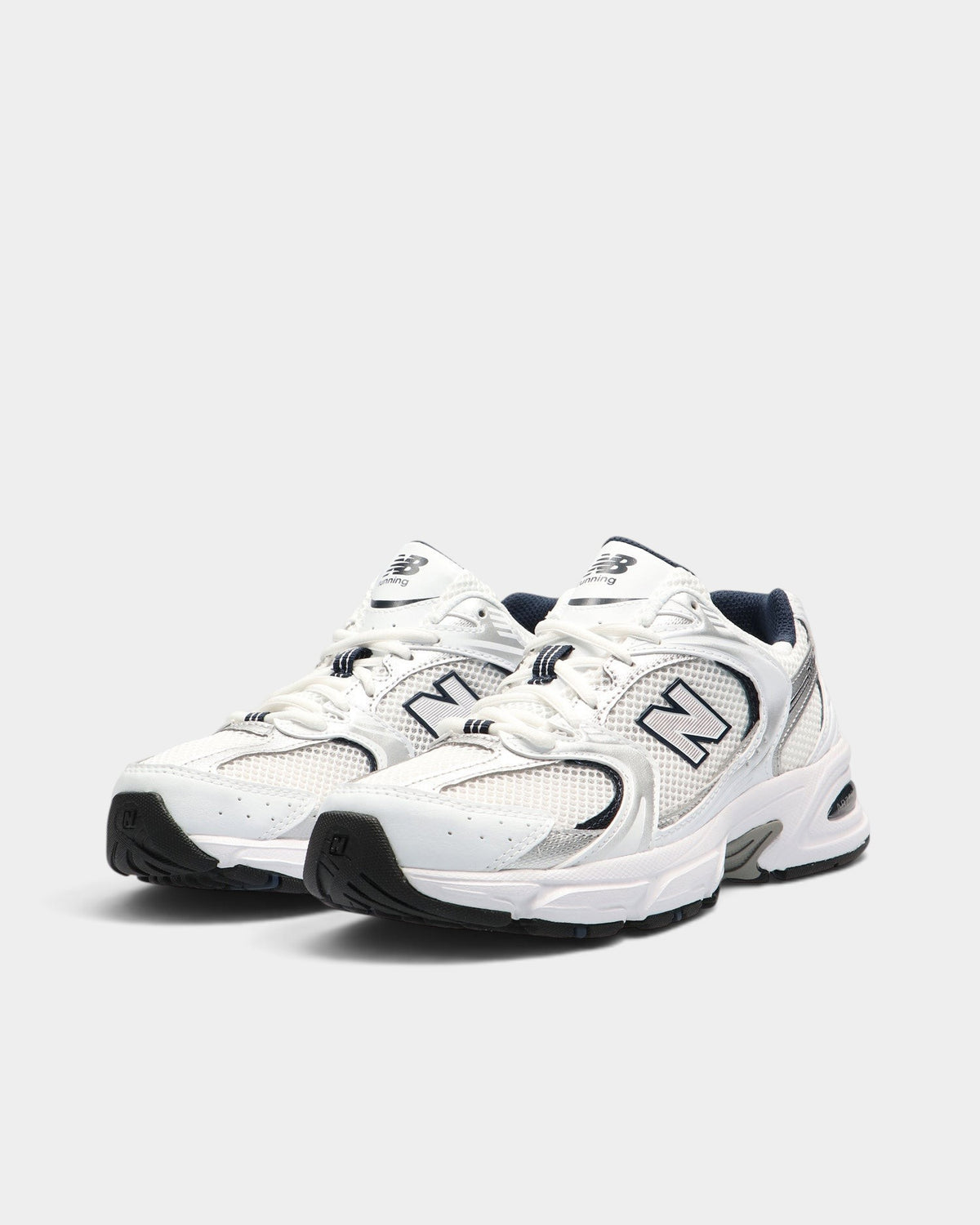 Lockwood Avenue New Balance 530 white and indigo mesh running shoes with ABZORB midsole cushioning