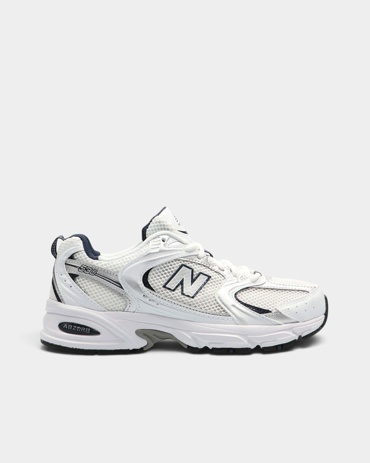 Lockwood Avenue New Balance 530 white and indigo mesh running shoes with ABZORB cushioning and retro silhouette.