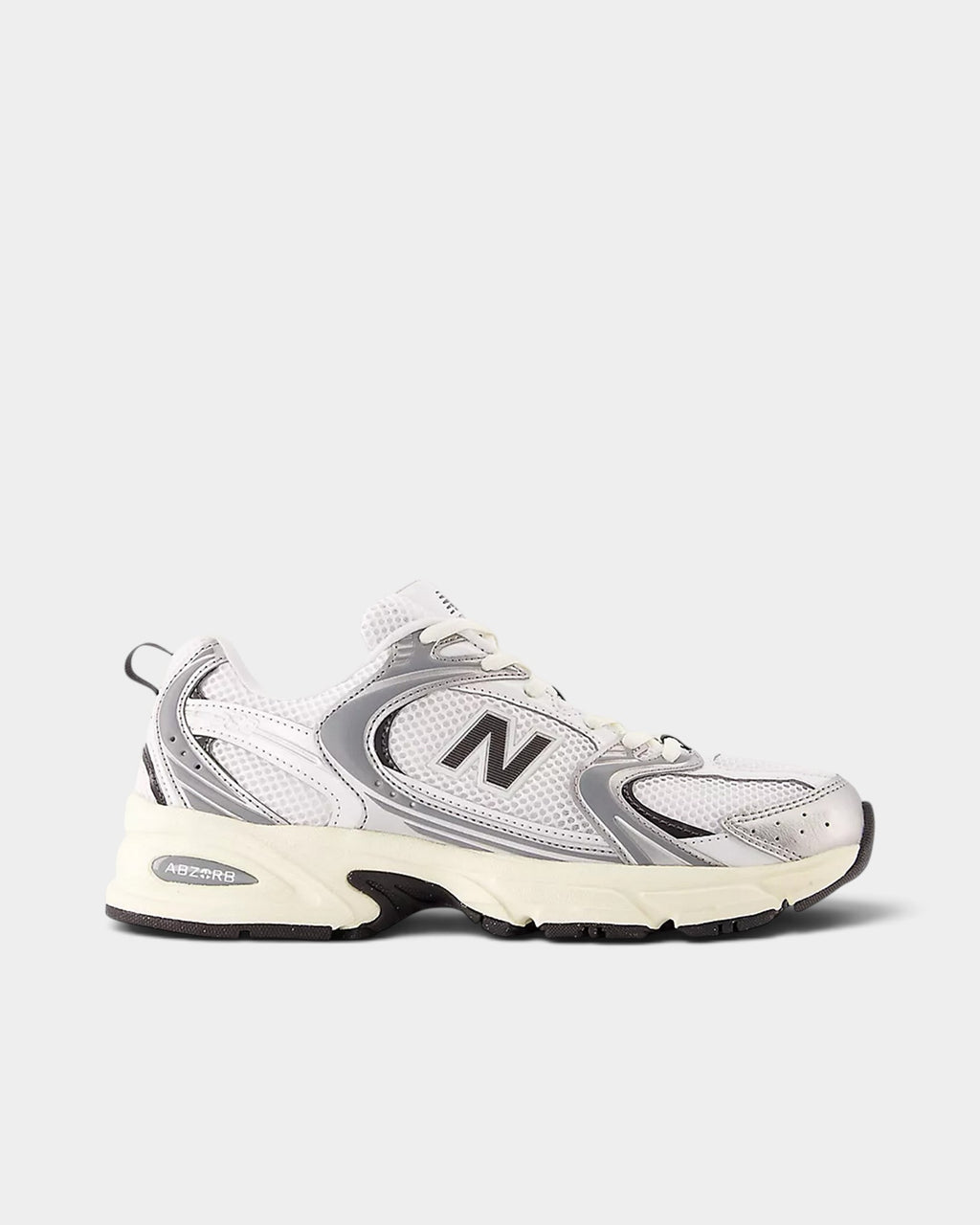 Lockwood Avenue New Balance 530 retro runner in white and silver mesh with ABZORB midsole cushioning.