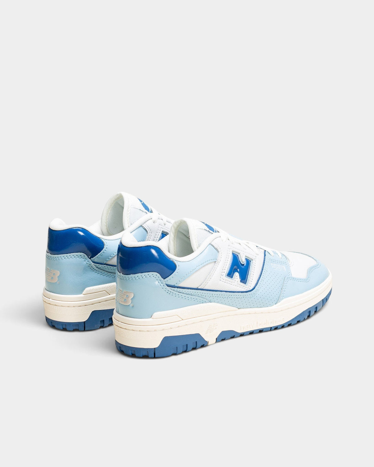 Lockwood Avenue New Balance 550 low-top sneakers in white leather with glossy blue patent leather overlays and N logo