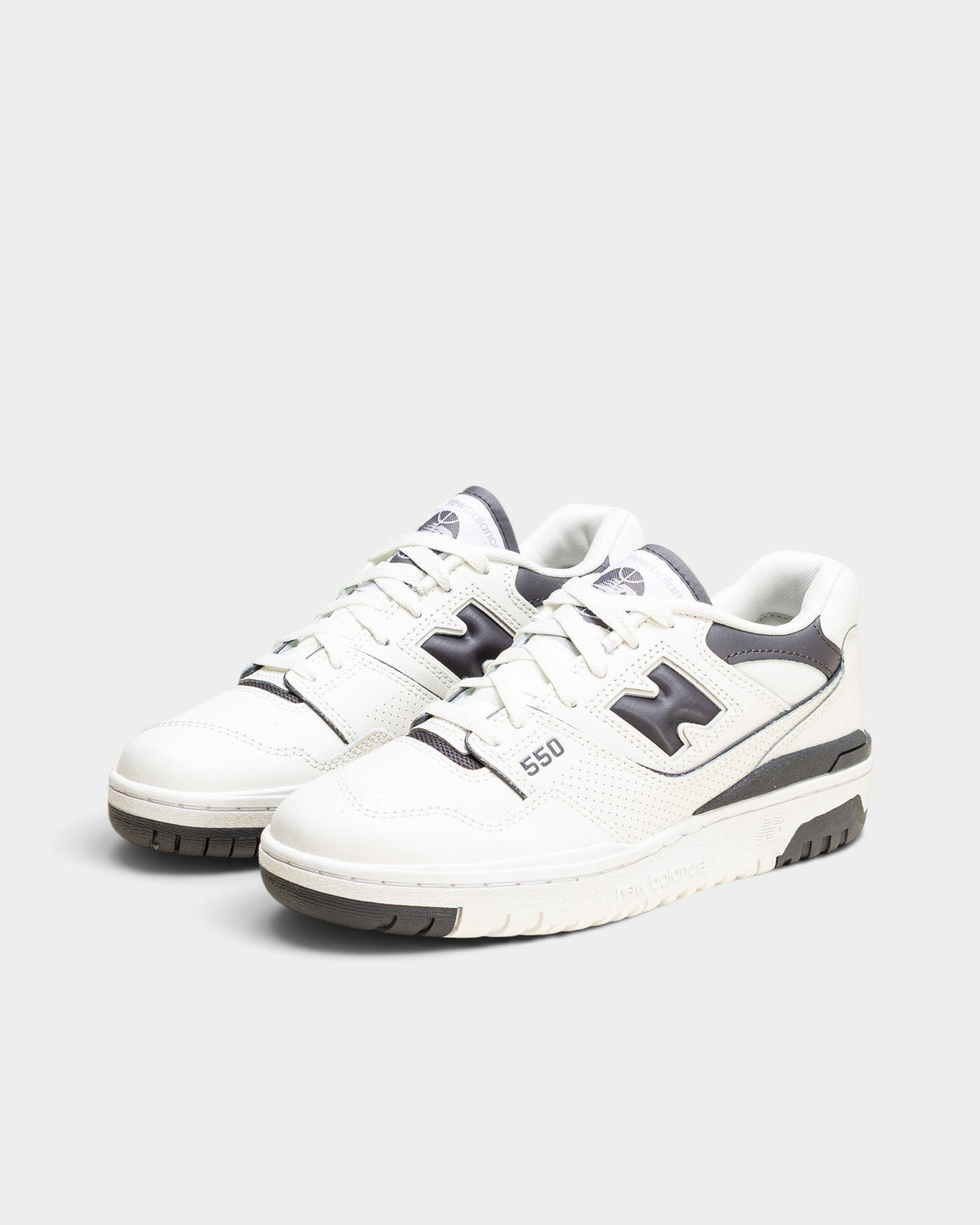 Lockwood Avenue New Balance 550 women's low-top sneakers in sea salt off-white leather with magnet gray overlays.