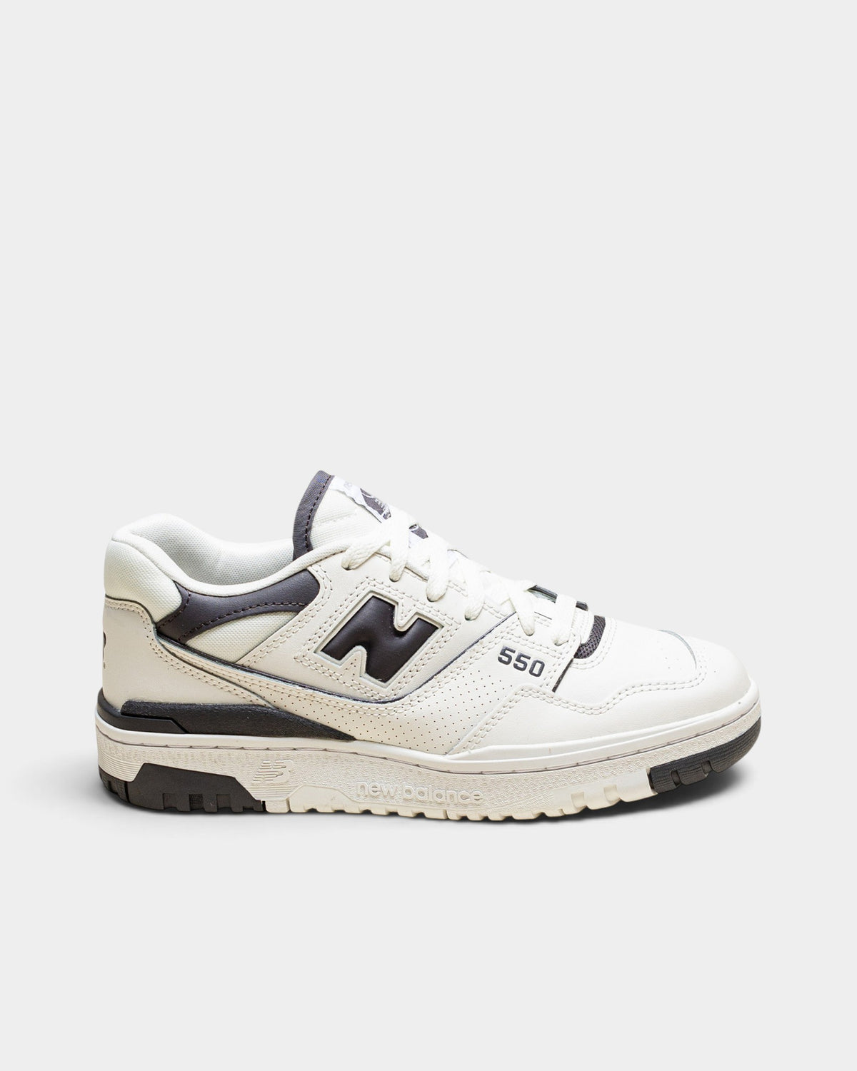 Lockwood Avenue New Balance 550 women's low-top sneakers in sea salt off-white leather with magnet gray overlays.