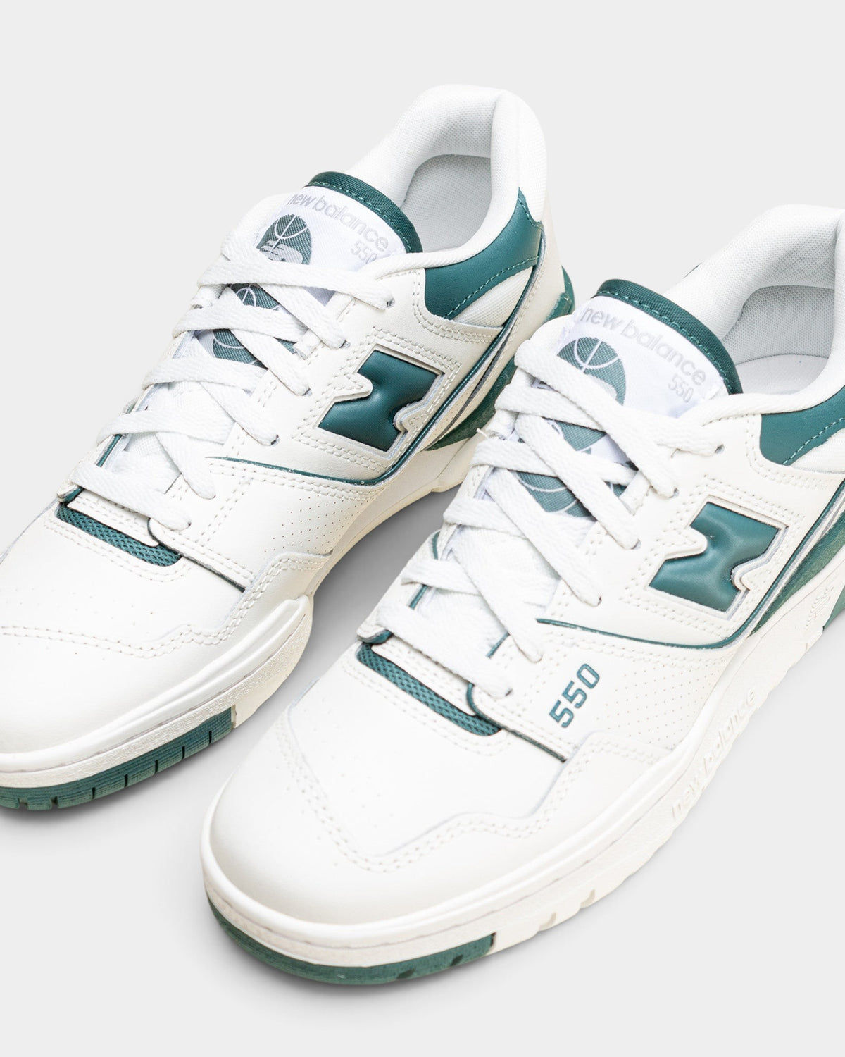 Lockwood Avenue women's New Balance 550 low-top sneakers in white leather with spruce green accents and N logo