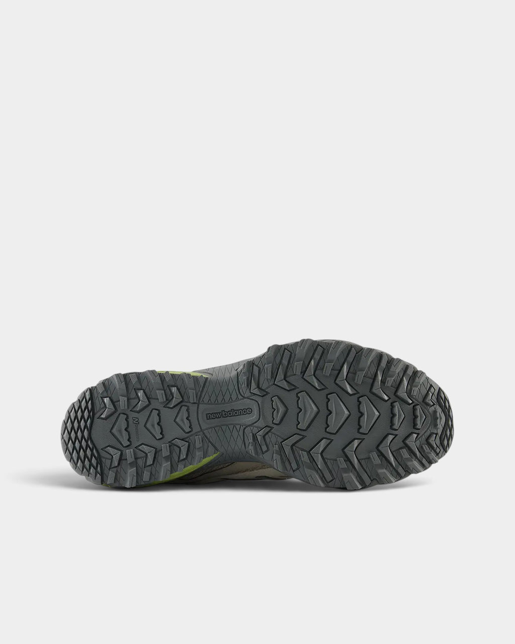 Lockwood Avenue New Balance 610Xv1 Gore-Tex trail shoe showing the aggressive black rubber tread outsole