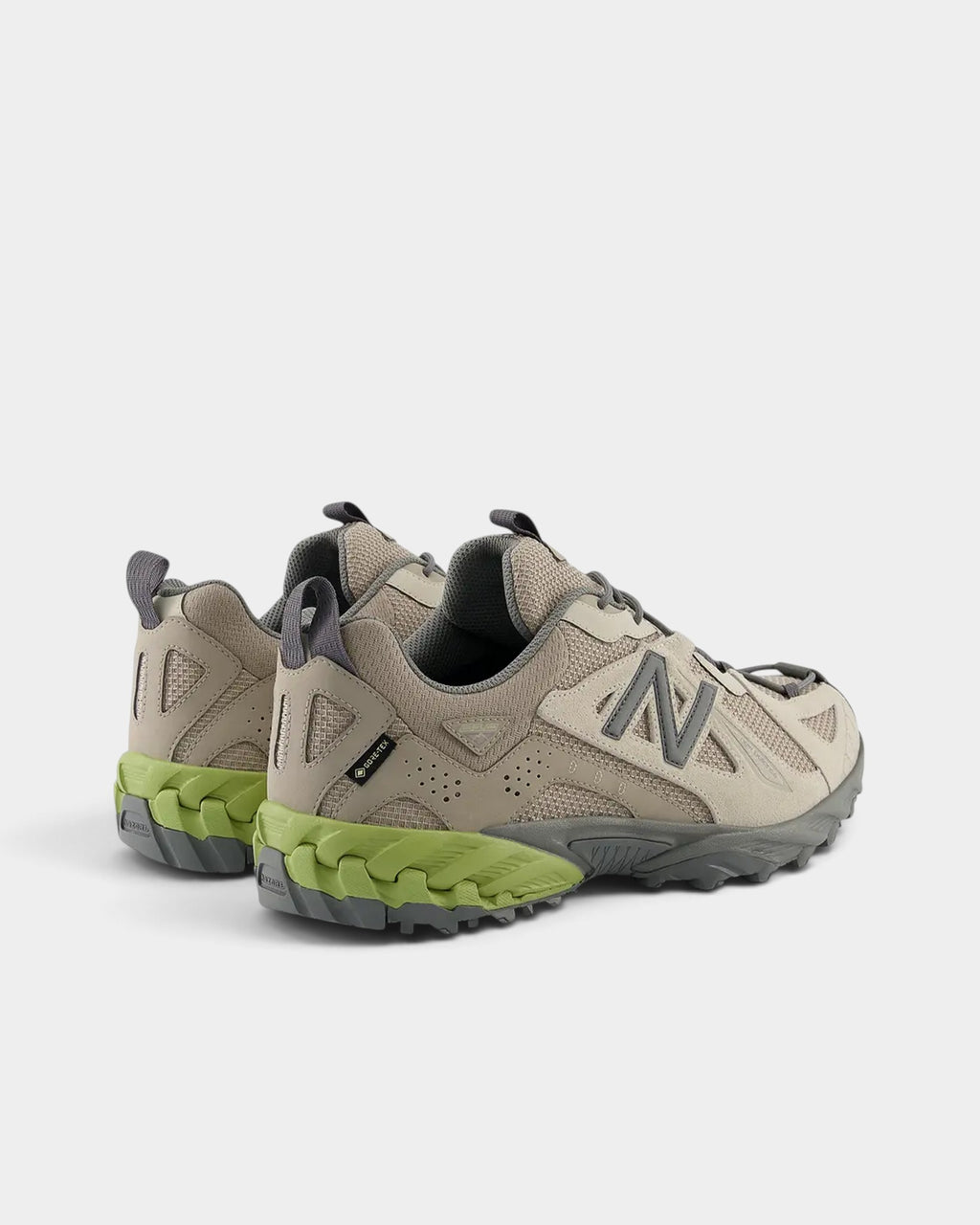 Lockwood Avenue New Balance 610Xv1 Gore-Tex trail shoes in light mushroom and timberwolf with green midsole accents.