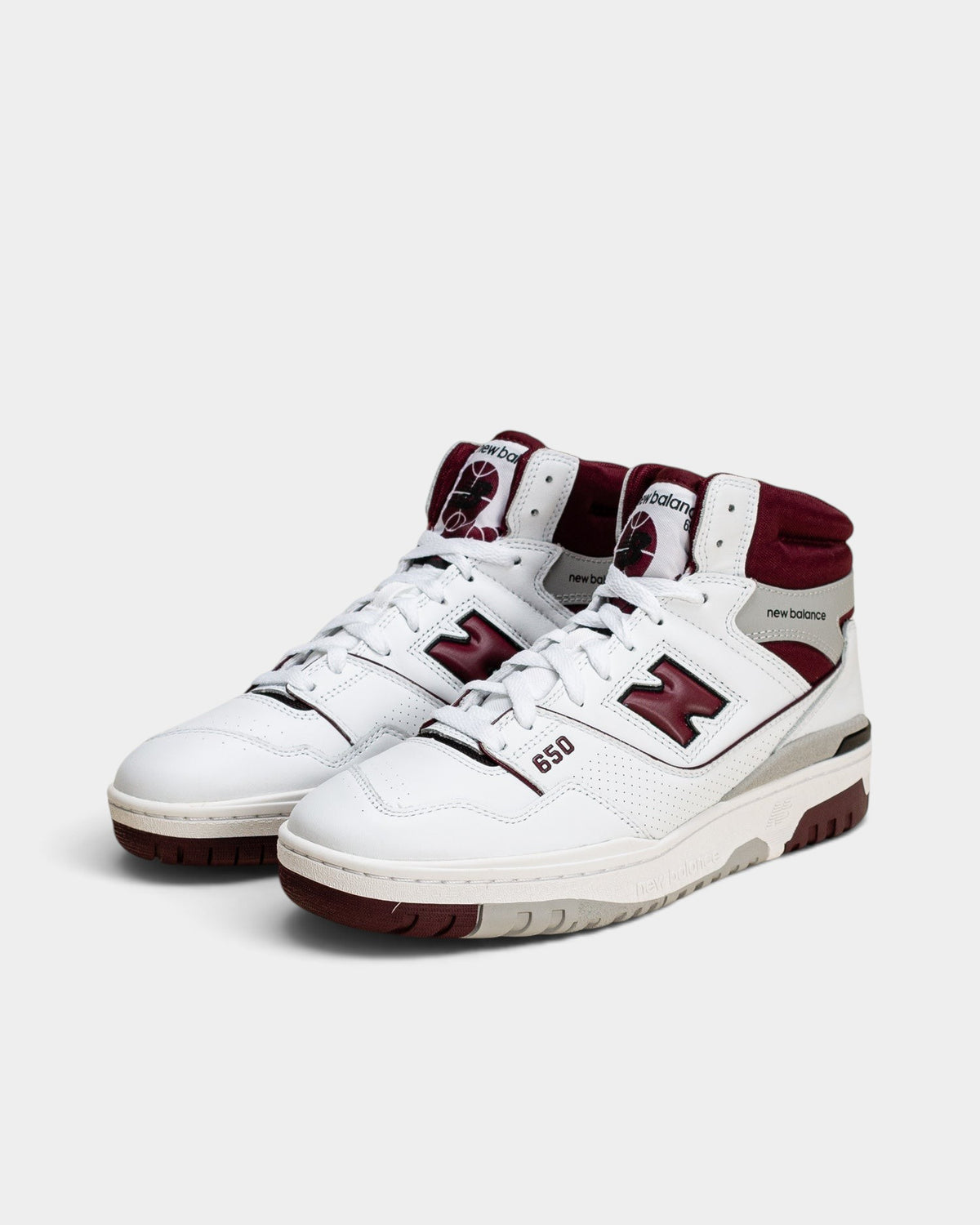 Lockwood Avenue New Balance 650 high-top sneakers in white leather with burgundy accents and gray heel detailing.