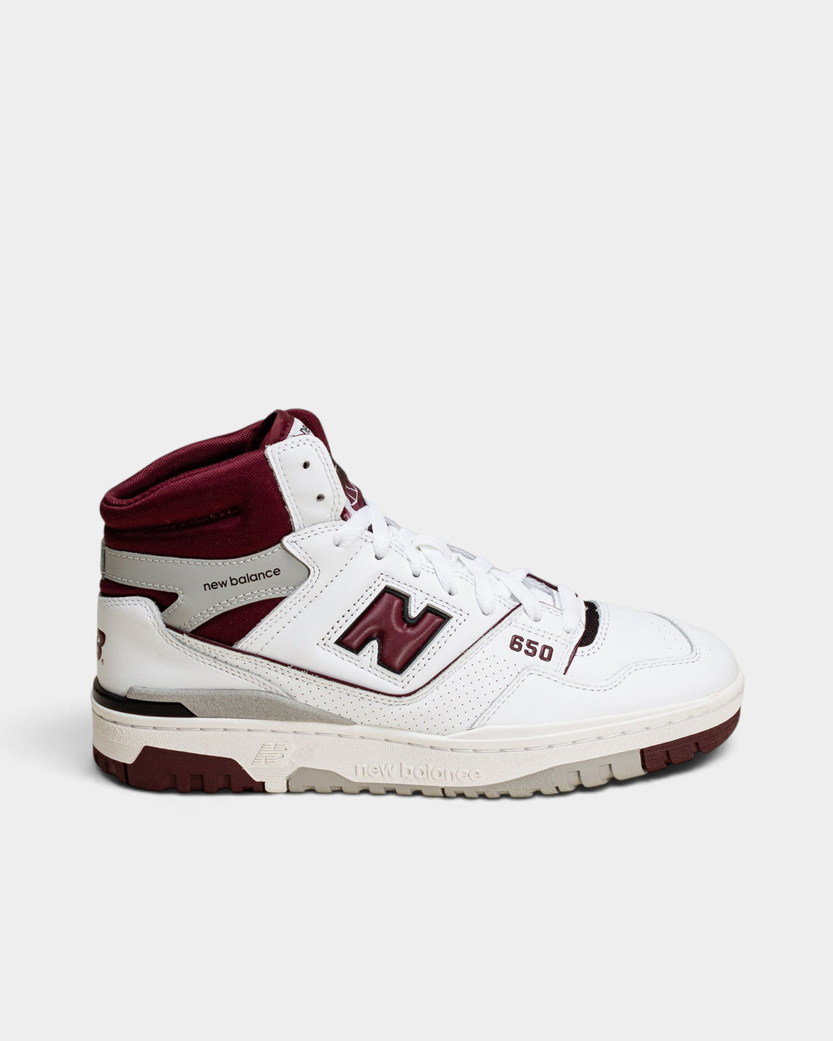 Lockwood Avenue New Balance 650 high-top sneakers in white leather with burgundy accents and gray heel detailing.