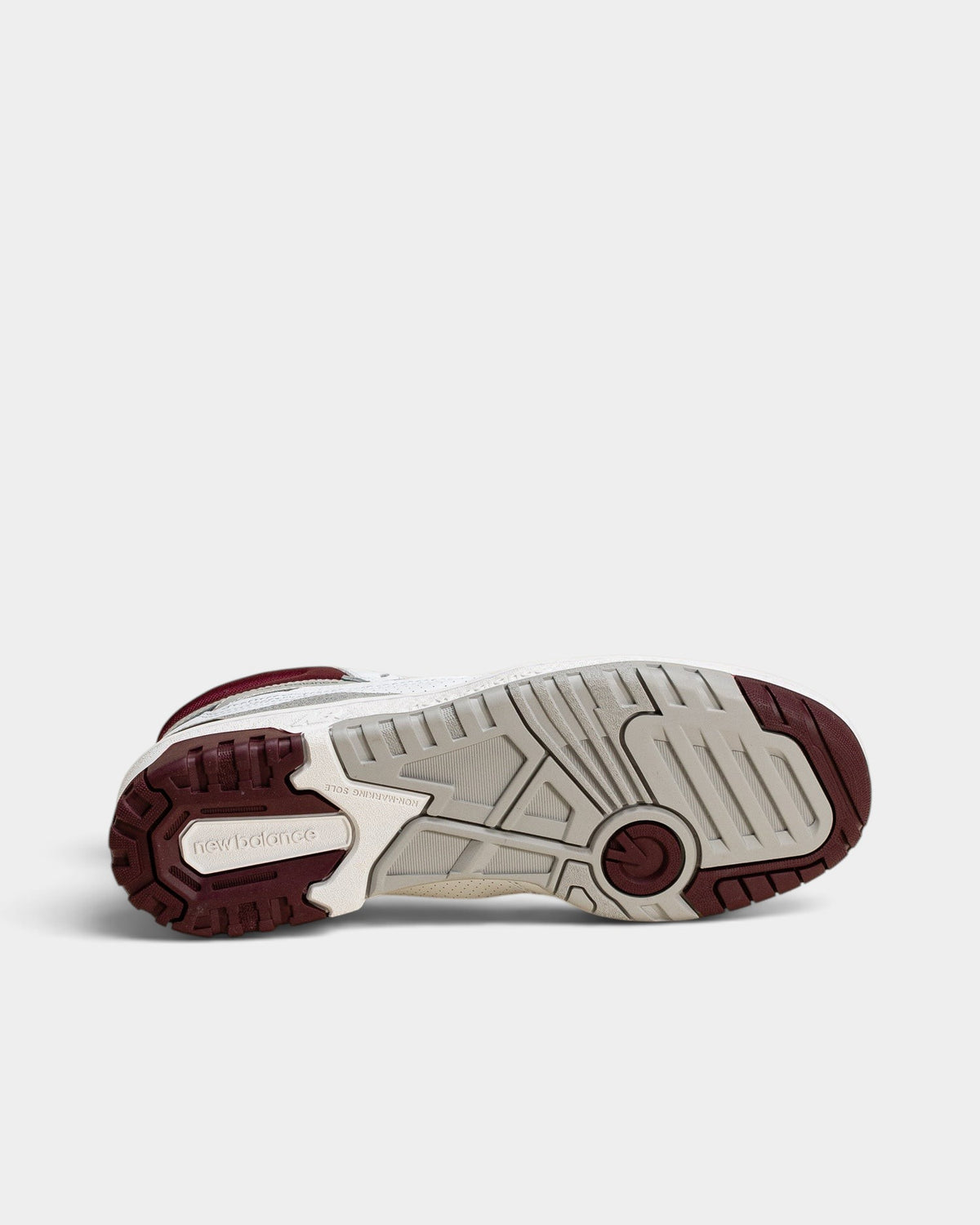 Lockwood Avenue New Balance 650 high-top sneaker showing the burgundy and gray rubber outsole pattern