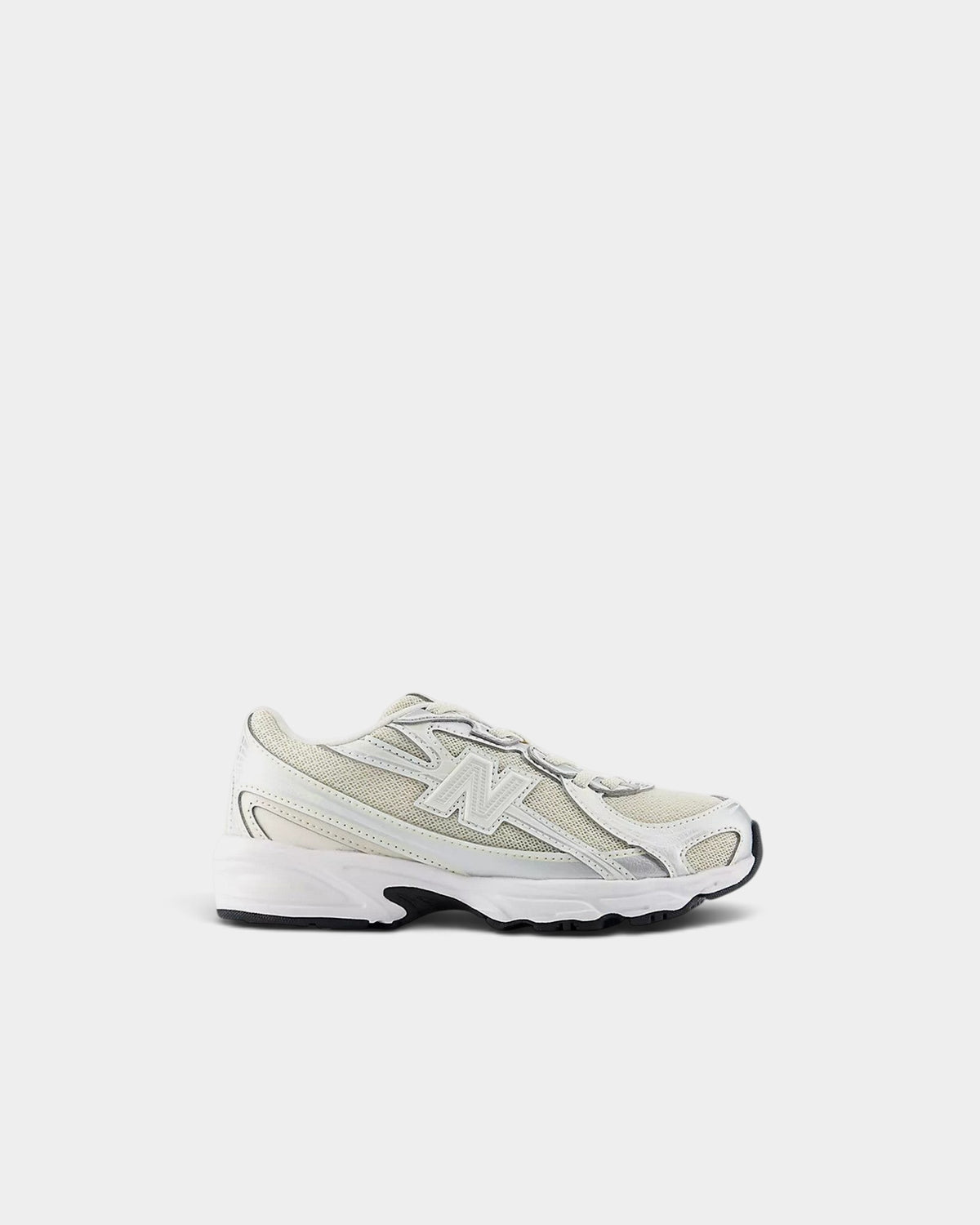 Lockwood Avenue New Balance 740 kids sneakers in off-white mesh with silver angular overlays and a white midsole.