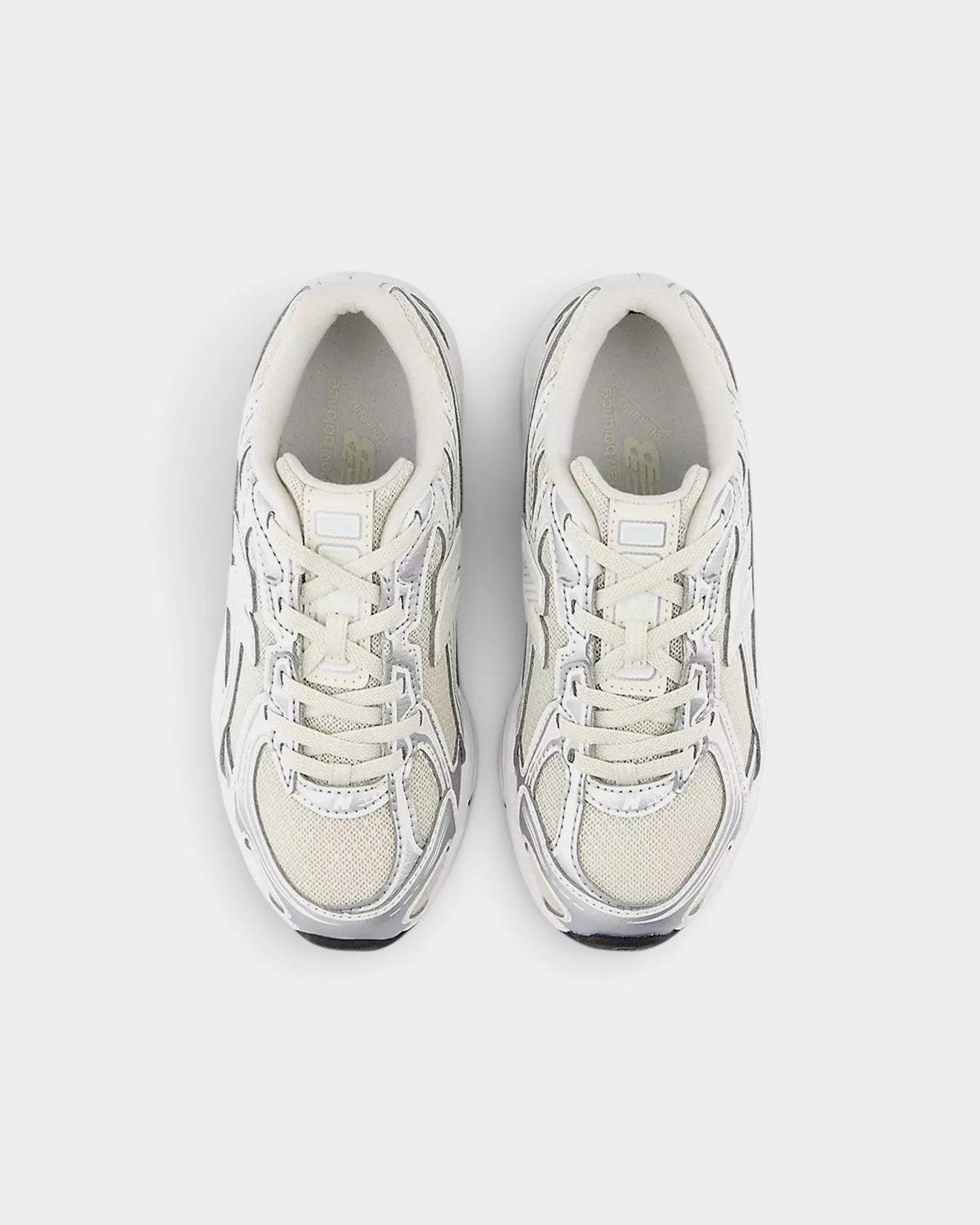Lockwood Avenue New Balance 740 kids sneakers in white and silver with open-knit mesh and angular overlays