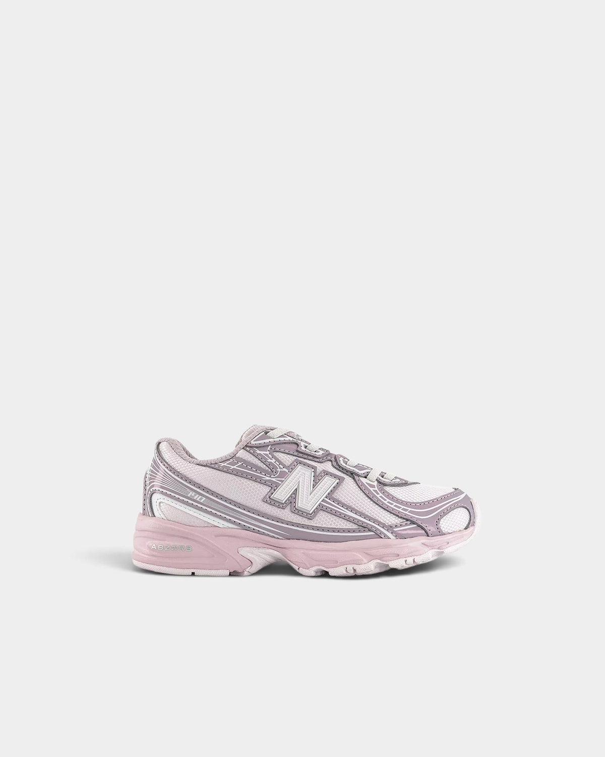 Lockwood Avenue New Balance 740 kids sneakers in light pink mesh with synthetic overlays and bungee lace closure