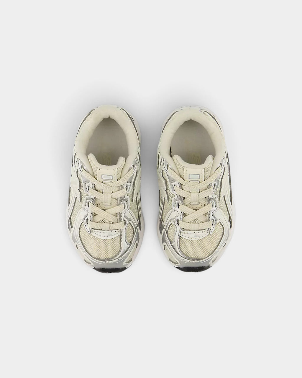 Lockwood Avenue New Balance 740 toddler shoes in cream mesh with silver angular overlays and a segmented midsole