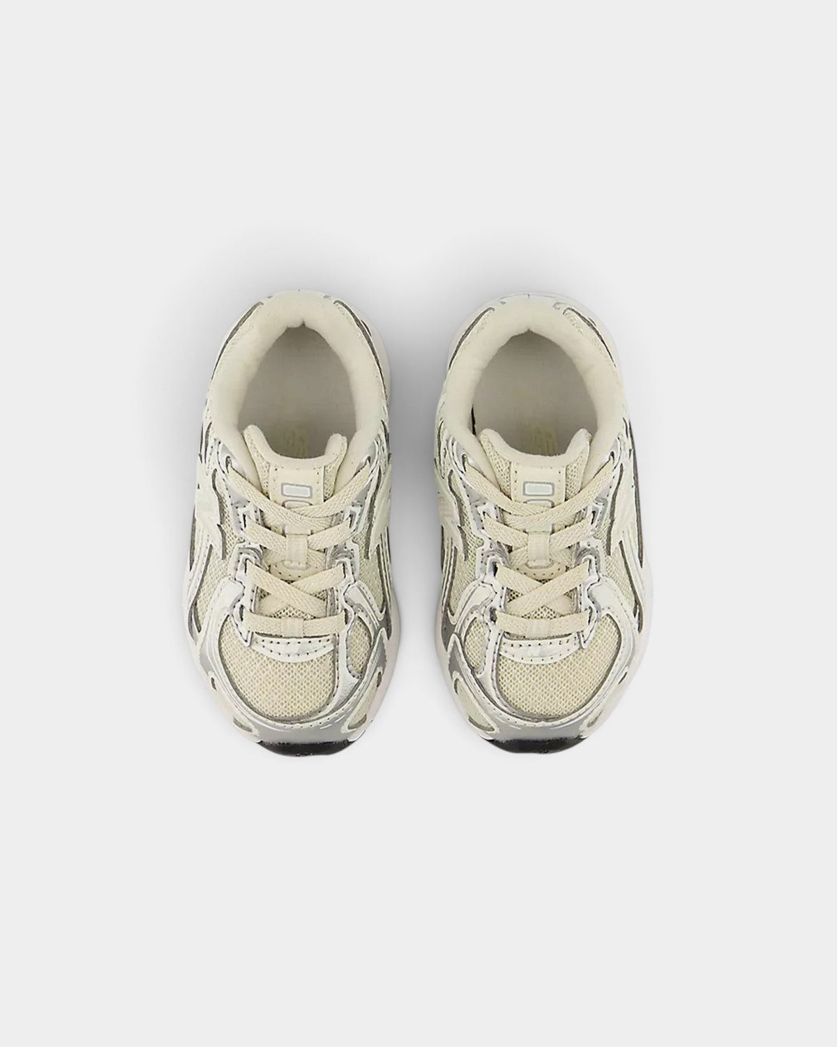 Lockwood Avenue New Balance 740 toddler shoes in cream mesh with silver angular overlays and a segmented midsole