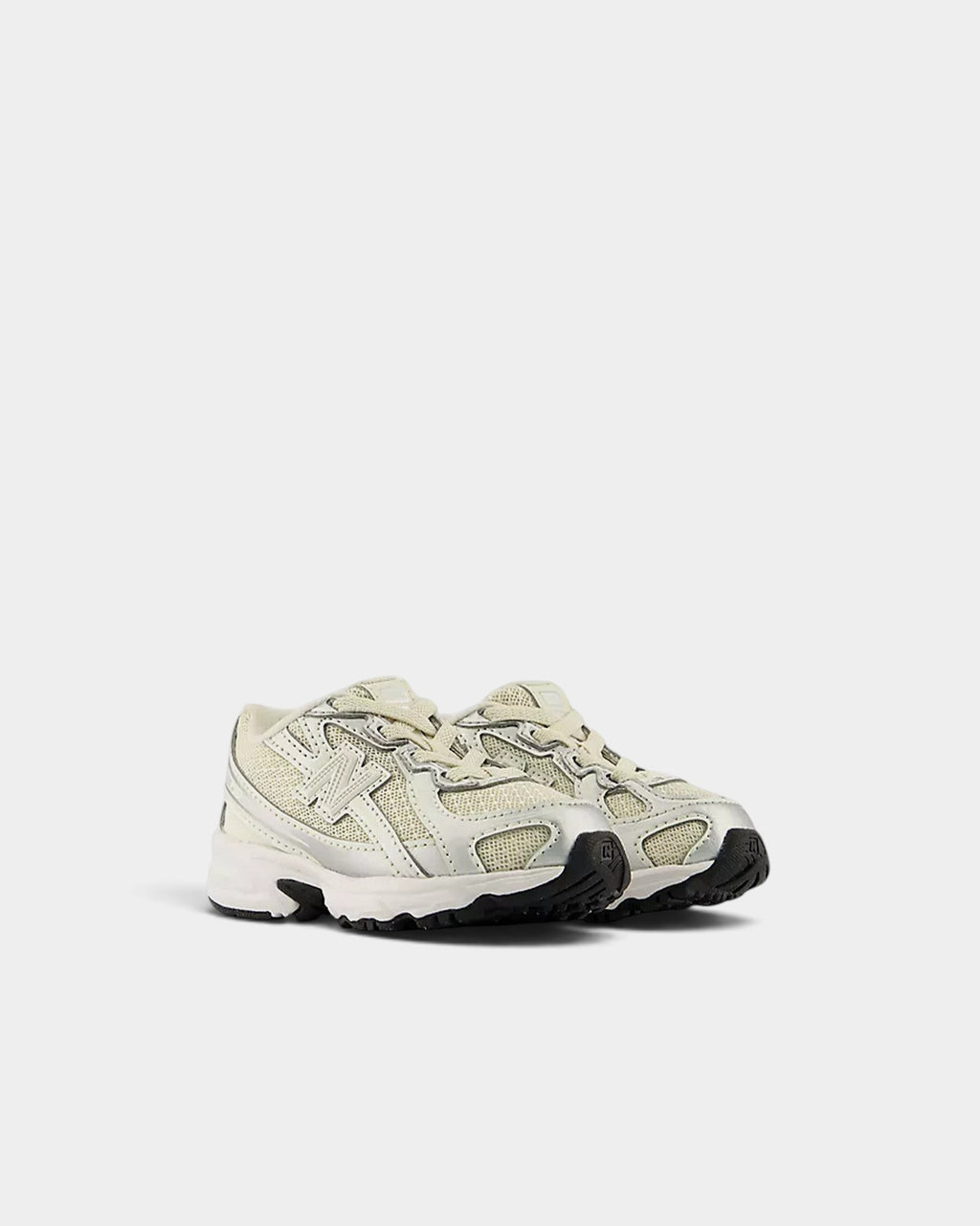 Lockwood Avenue New Balance 740 toddler shoes in cream mesh and metallic silver with a segmented midsole