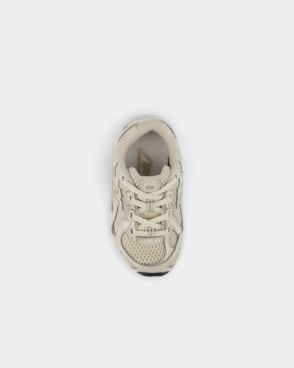 Lockwood Avenue New Balance 740 toddler shoes in silver metallic and cloud tones with mesh and synthetic overlays.