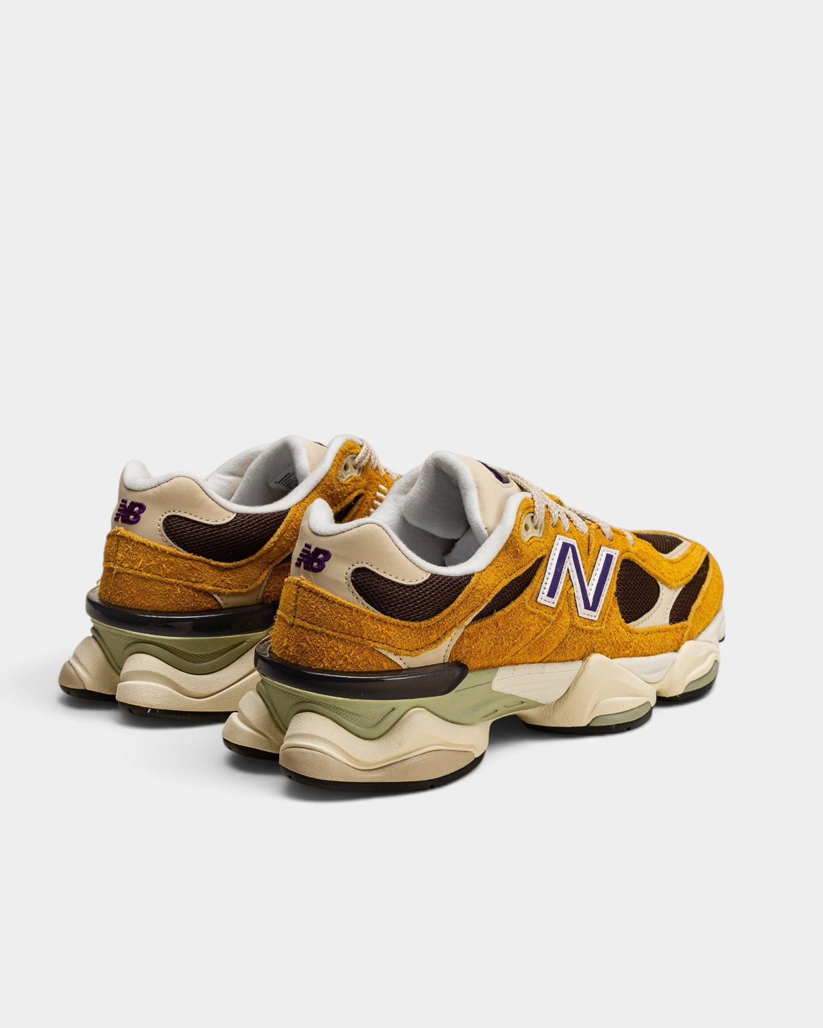 Lockwood Avenue New Balance 9060 sneakers in butterscotch shaggy suede and mesh with chunky sculpted midsoles.