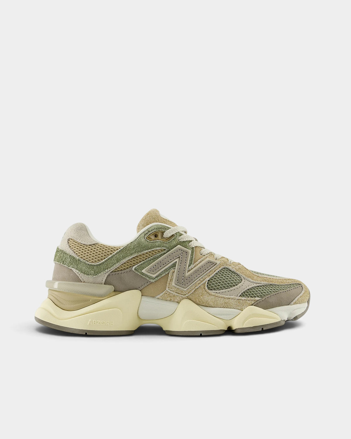 Lockwood Avenue New Balance 9060 sneakers in olivine green mesh and sandy beige suede with a sculpted pod midsole.