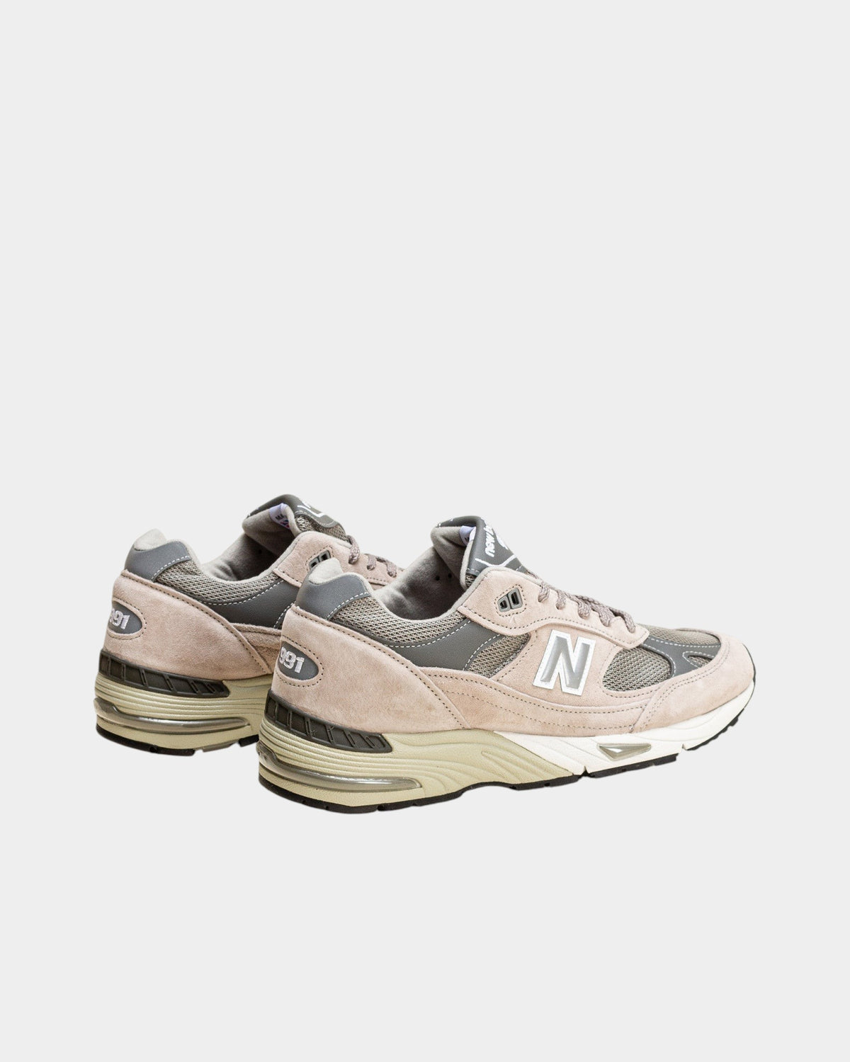 Lockwood Avenue New Balance 991 women's sneakers in gray nubuck and mesh with suede overlays and ABZORB midsole.