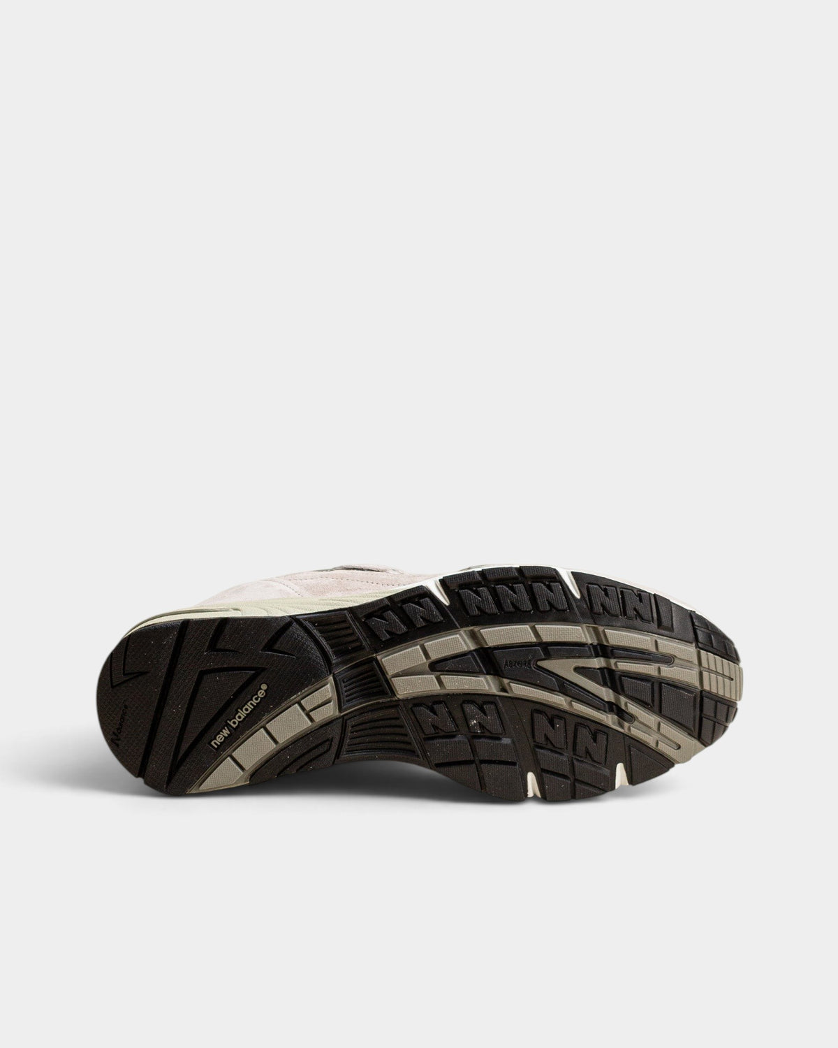 Lockwood Avenue New Balance 991 women's sneaker showing the black and grey rubber outsole tread pattern