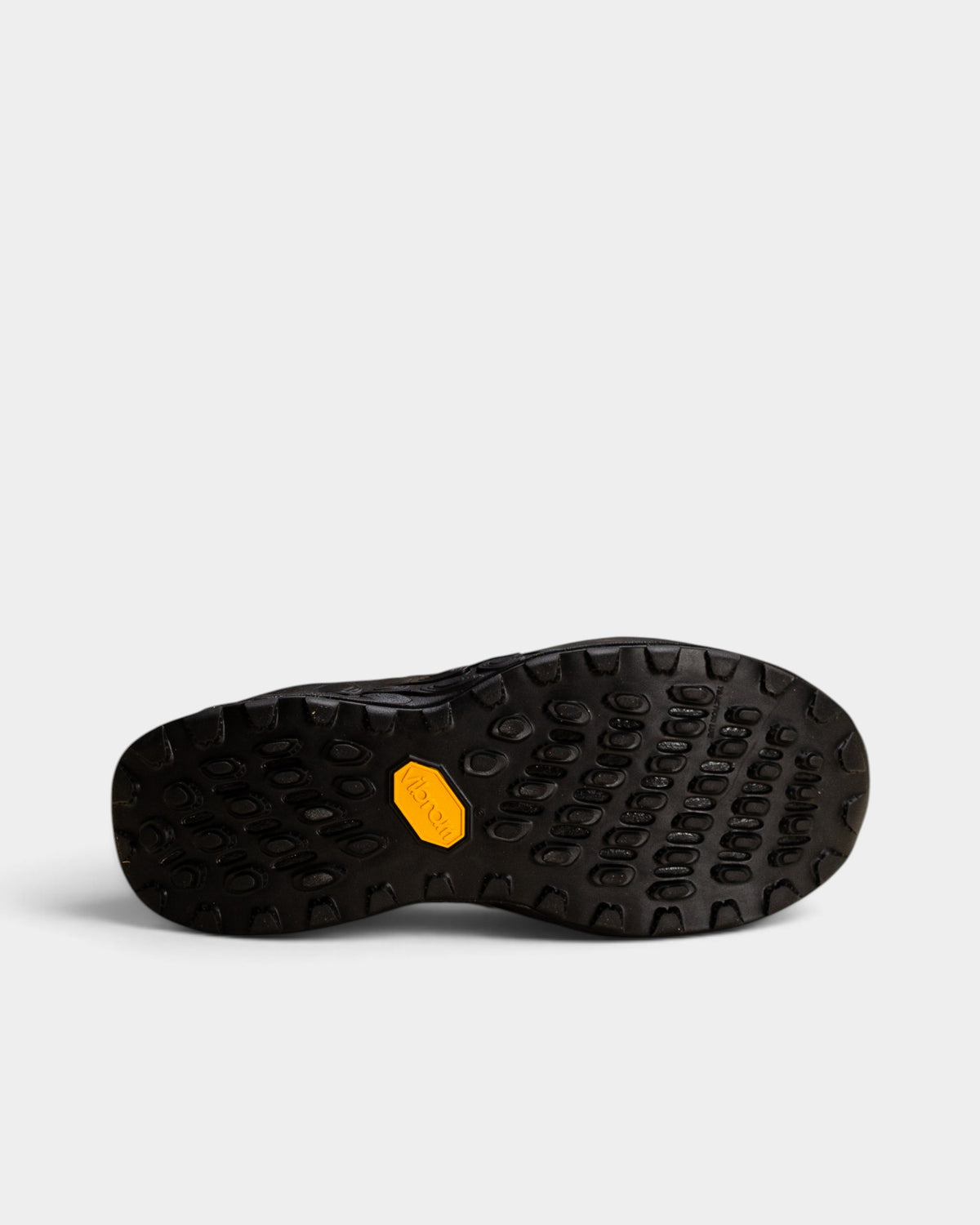 Lockwood Avenue New Balance Fresh Foam X Hierro v8 trail shoe black Vibram outsole with yellow logo detail