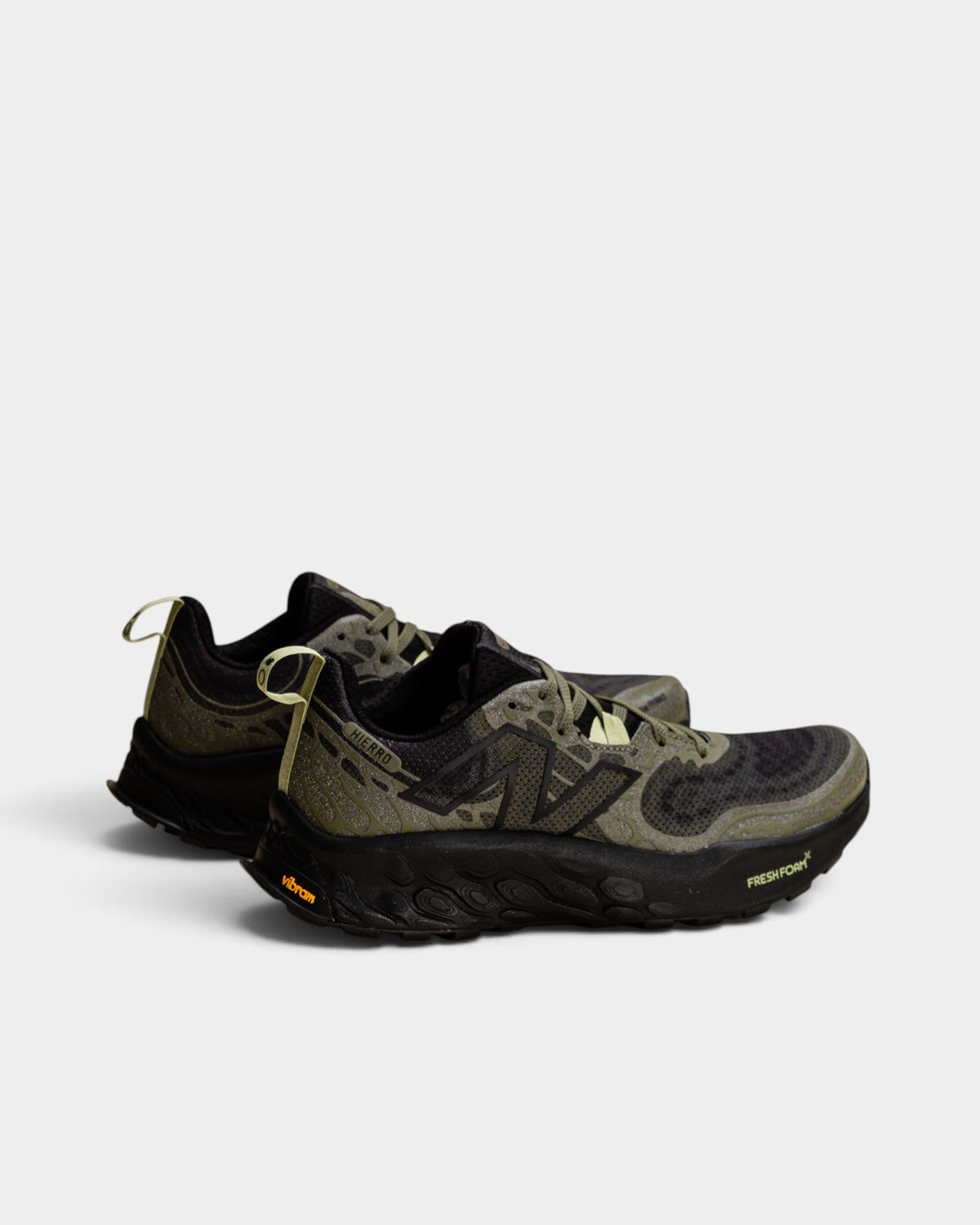 Lockwood Avenue New Balance Fresh Foam X Hierro v8 trail running shoes in olive green with black Vibram outsoles.