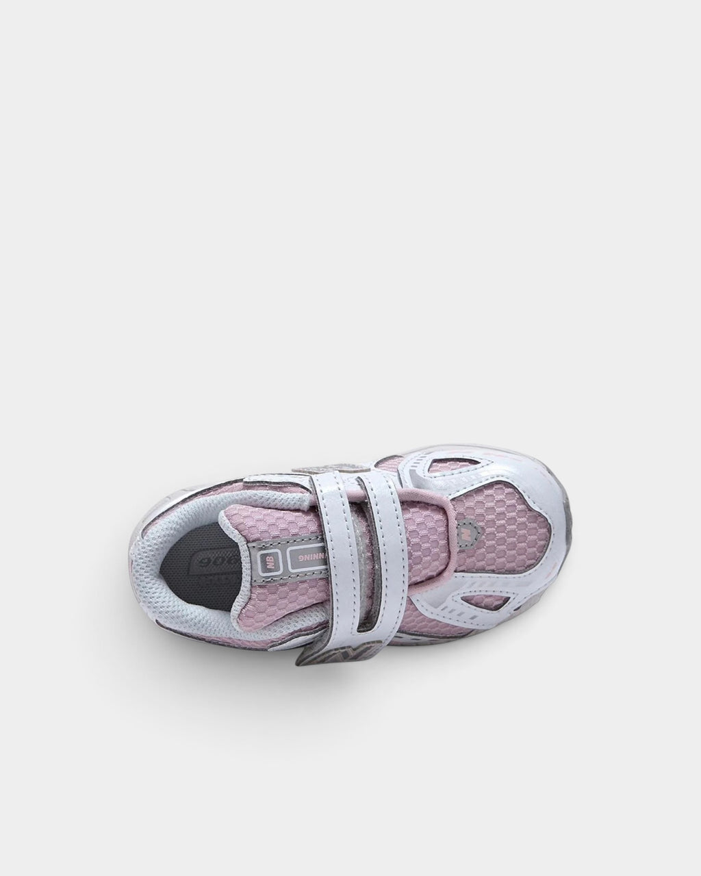 Lockwood Avenue New Balance 1906 toddler sneakers in white and rose sugar with hook-and-loop straps and mesh upper.