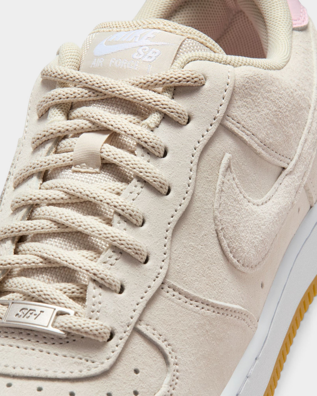 Lockwood Avenue Nike SB Air Force 1 low-top skate shoes in Light Orewood Brown suede with pink foam accents