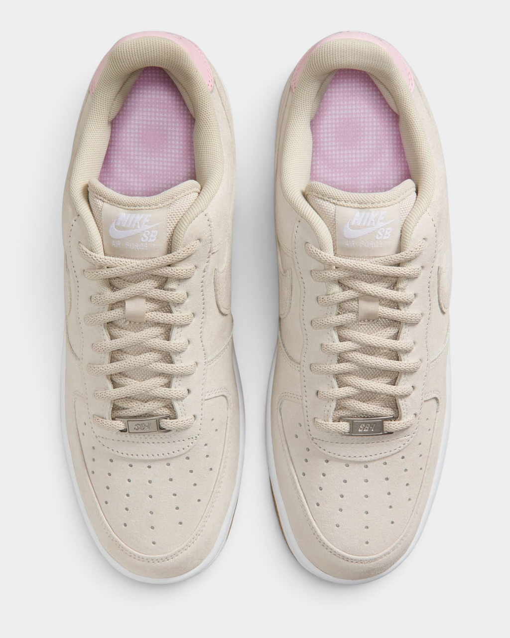 Lockwood Avenue Nike SB Air Force 1 low-top skate shoes in Light Orewood Brown suede with Pink Foam accents.