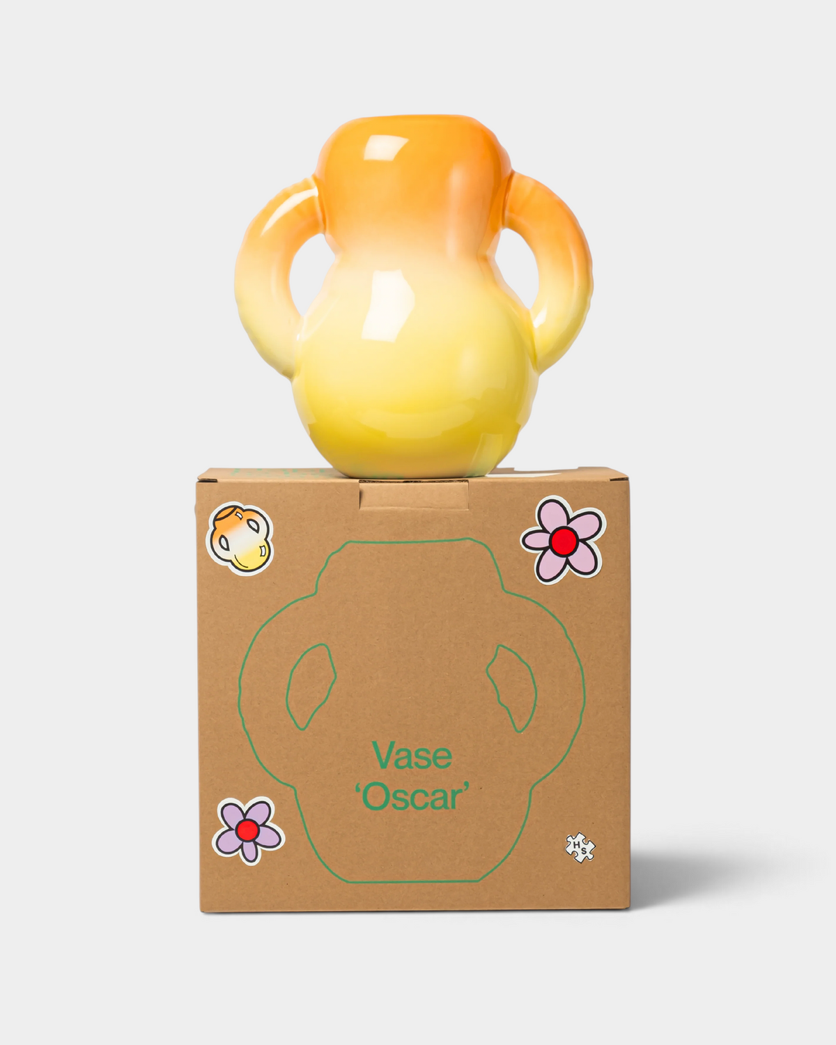 Lockwood Avenue Home Studyo OSCAR ceramic vase with orange to yellow ombre finish, displayed on its branded box.
