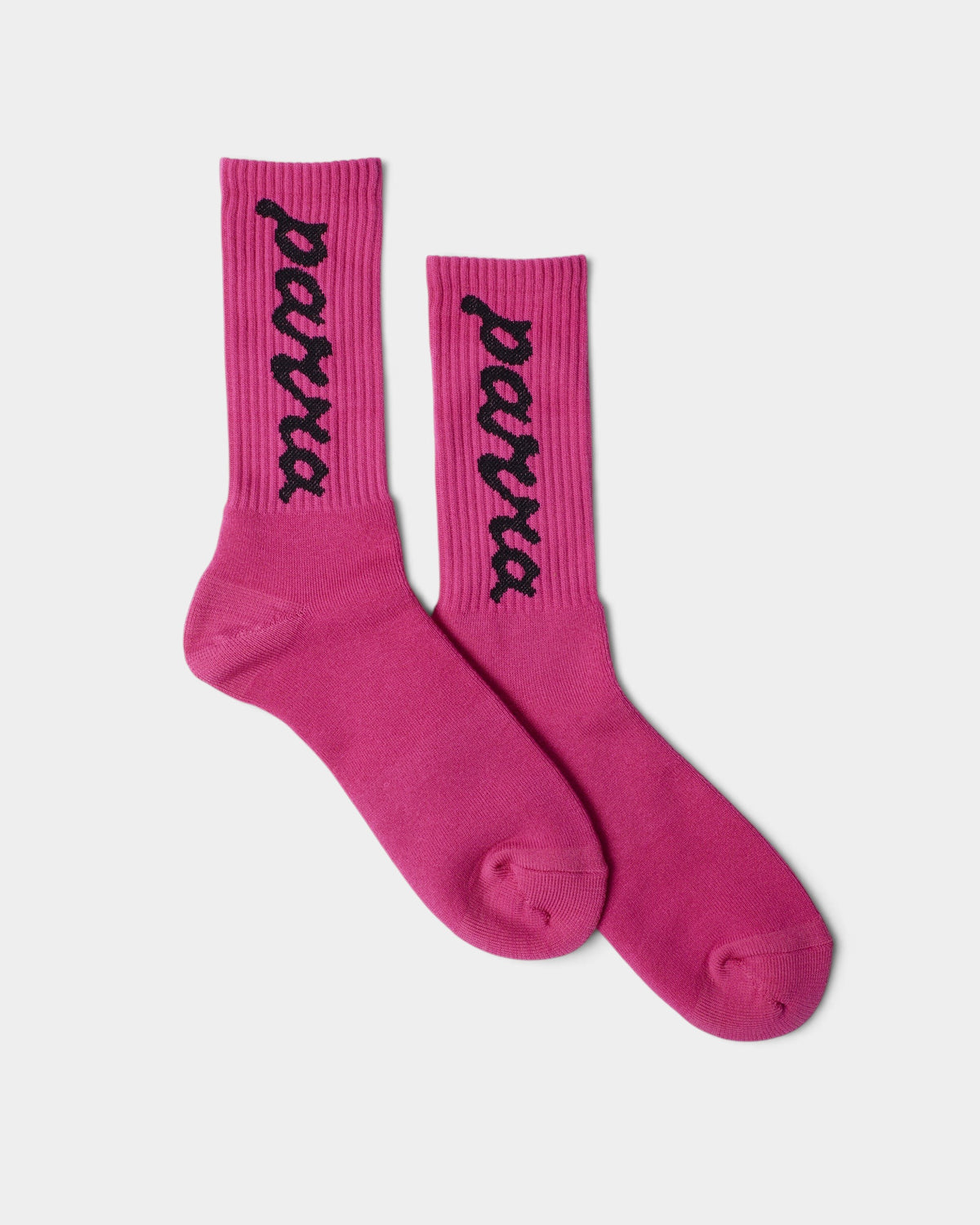 Lockwood Avenue by Parra pink crew socks with black lowercase script logo woven on the ribbed cuffs