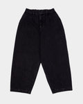 Lockwood Avenue Poetic Collective balloon-leg jeans in washed black cotton denim with pleated waist and elastic band.